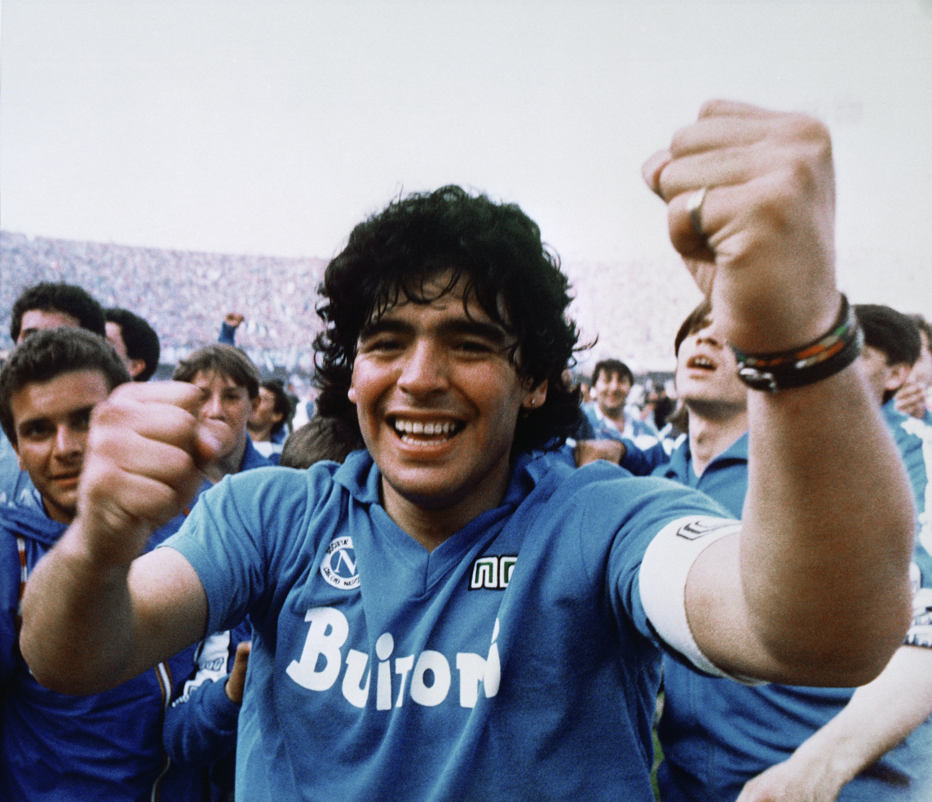 Argentine soccer superstar Diego Armando Maradona cheers after the Napoli team clinched its first Italian major league title in Naples, Italy, on May 10, 1987. (AP Photo/Massimo Sambucetti)