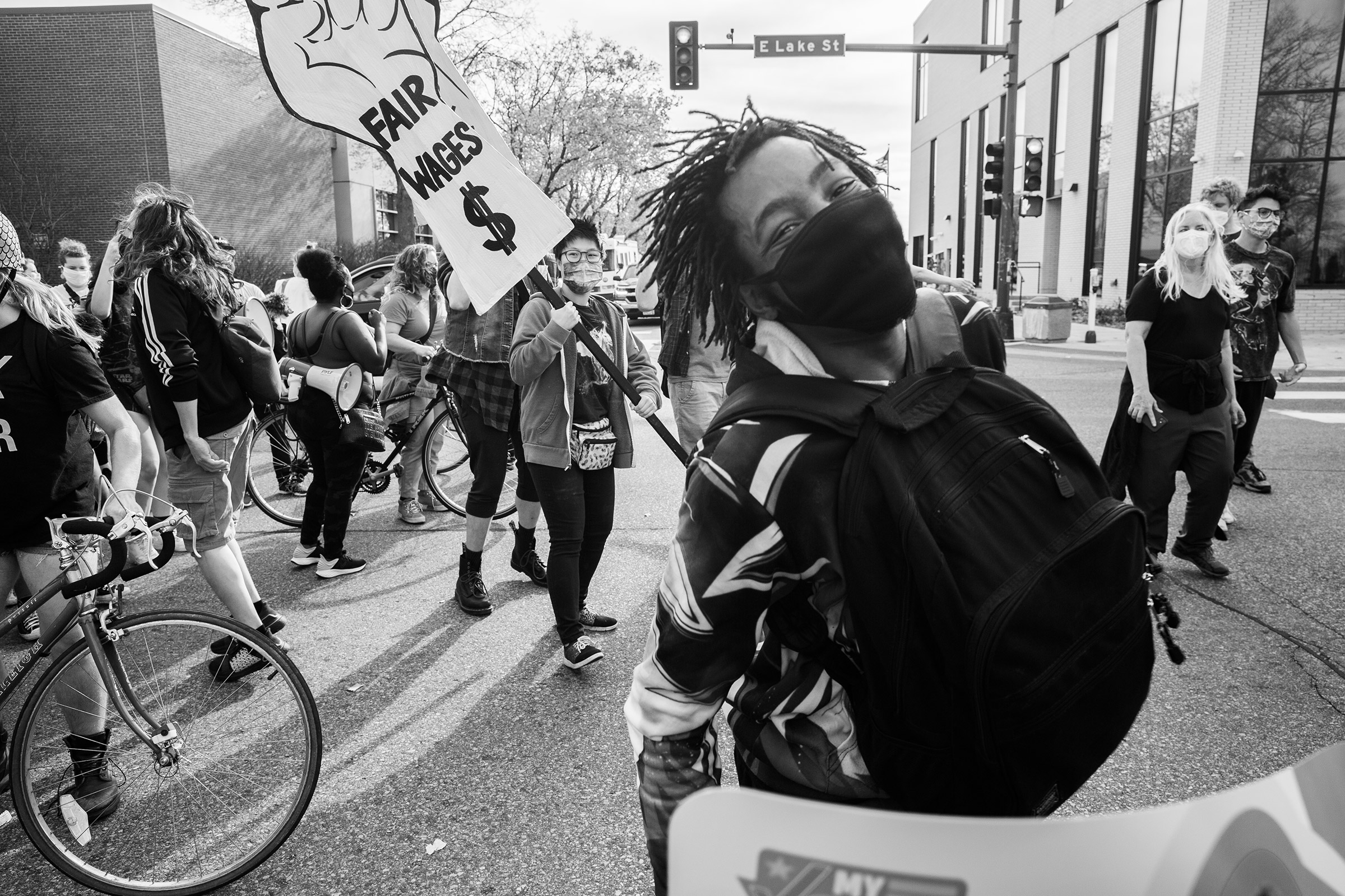 Demonstrators march and dance in South Minneapolis on Nov. 7. (Patience Zalanga for TIME)
