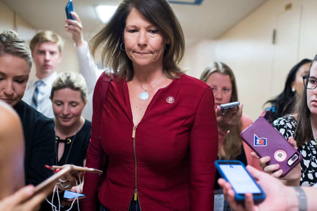 Rep. Cheri Bustos, D-Ill., talks with reporters after a meeting of the House Democratic caucus in the Capitol in Washington, DC, on July 16, 2019. (Tom Williams—CQ Roll Call)