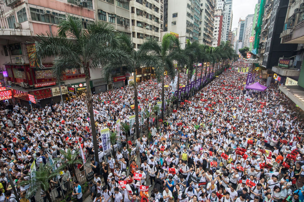 Demonstrators march during a protest against a proposed extradition law in Hong Kong, China, on Sunday, June 9, 2019. (Paul Yeung/Bloomberg via Getty Images)