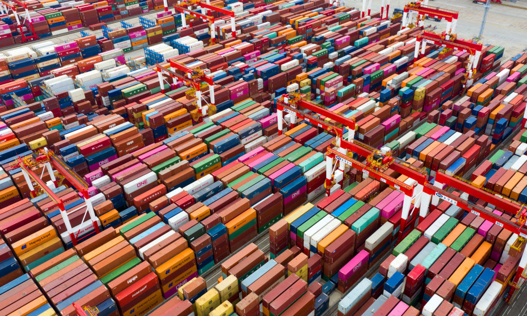 Aerial photography of Yangshan deep water port terminal ships for lifting operations, including many of the world's container ships carrying exhibits for the third China International Fair. Shanghai, China, October 25, 2020.