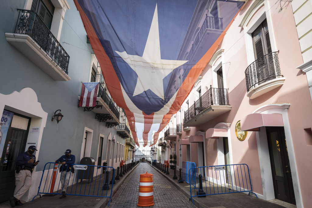 The Puerto Rican flag is seen outside the Governor's residence as Puerto Ricans vote in the general election in San Juan, Puerto Rico on November 03, 2020. (Alejandro Granadillo—Anadolu Agency/Getty Images)