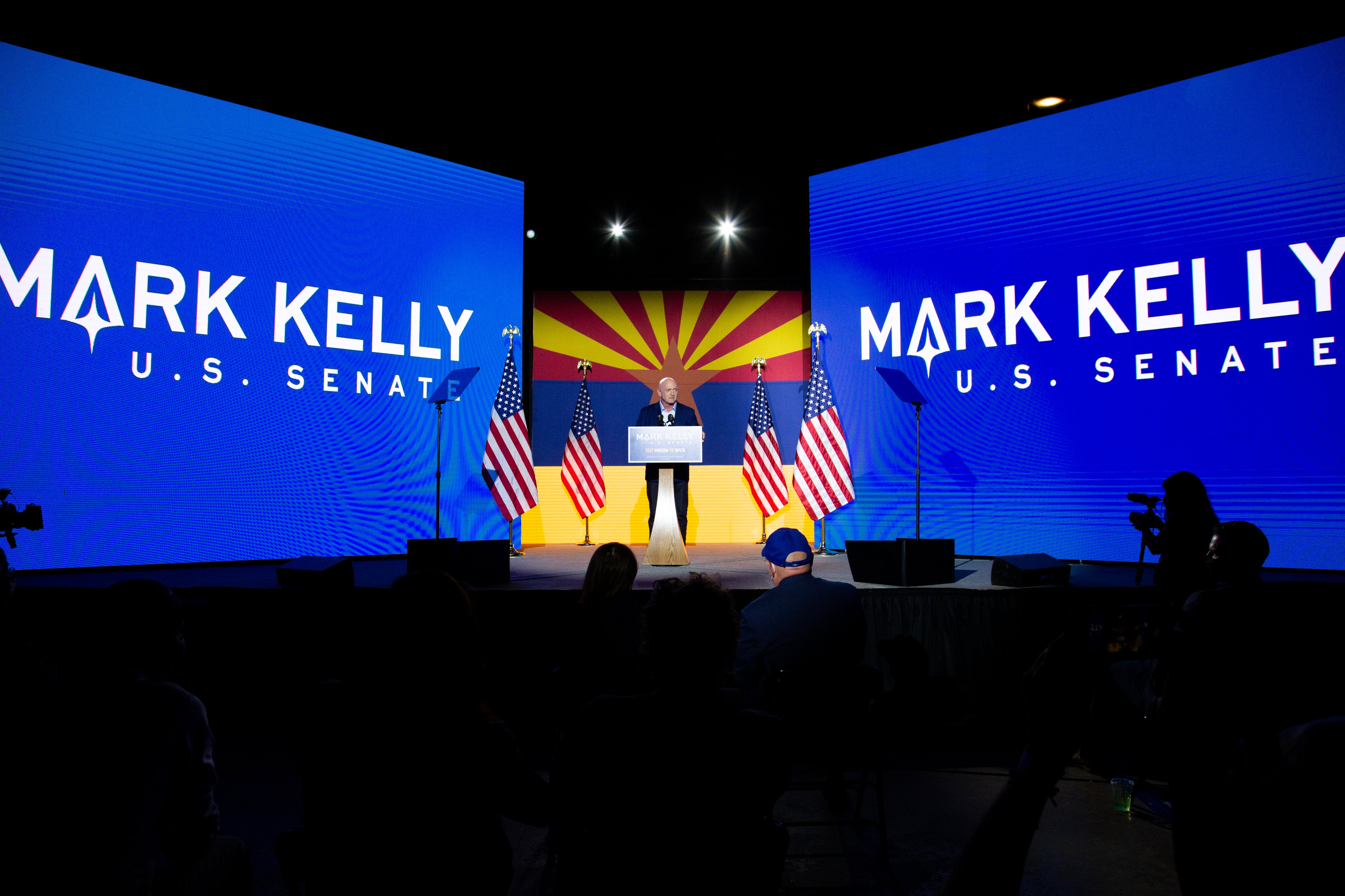 Democrat Mark Kelly speaks to supporters in Tucson, Ariz., on Nov. 3, while awaiting results of his Senate race against Republican Martha McSally. (Courtney Pedroza—Getty Images)