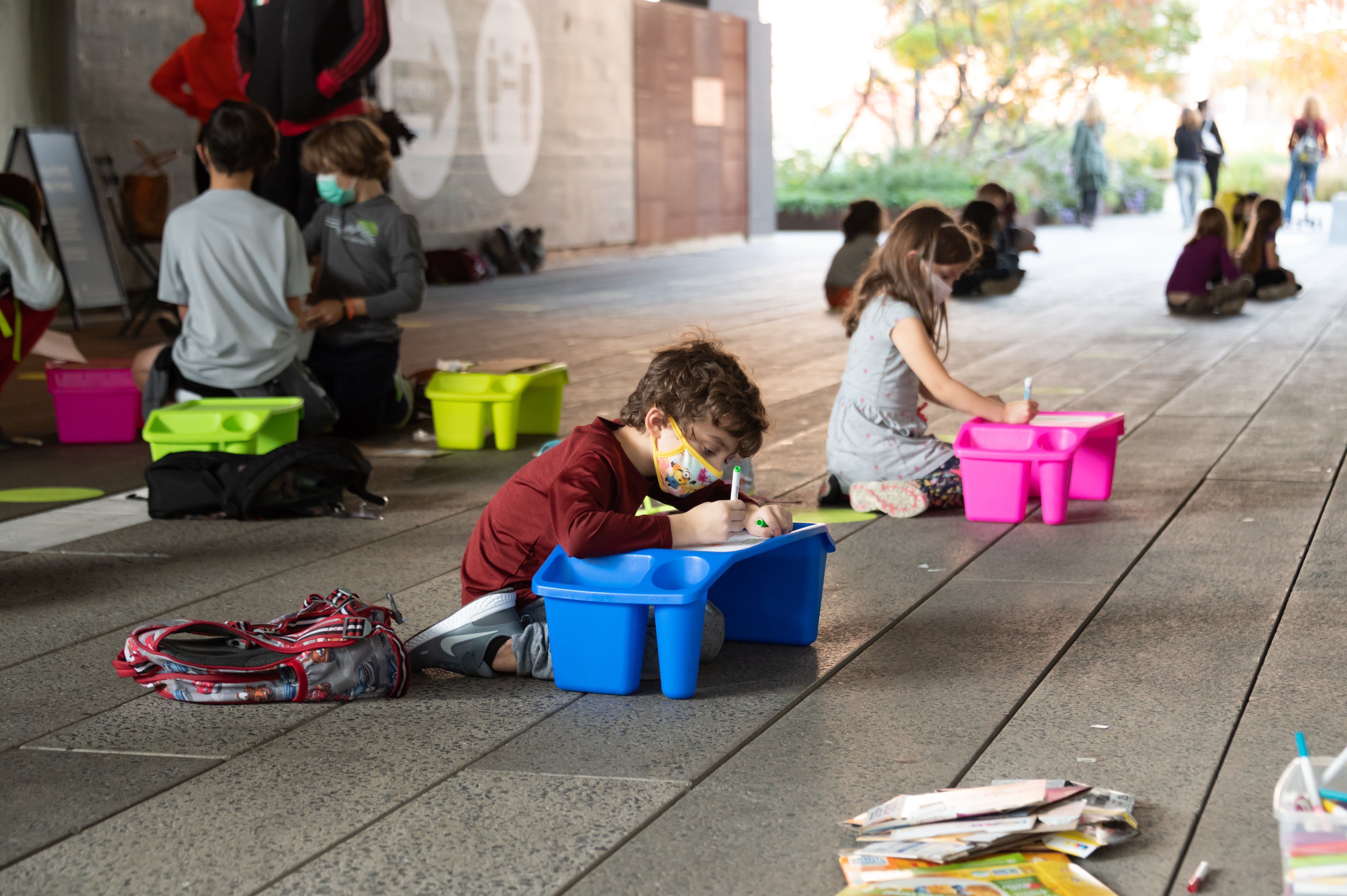 Students from PS 11 in New York City do their lessons outdoors, at the city's High Line park, on Oct. 21, 2020. (Noam Galai—Getty Images)