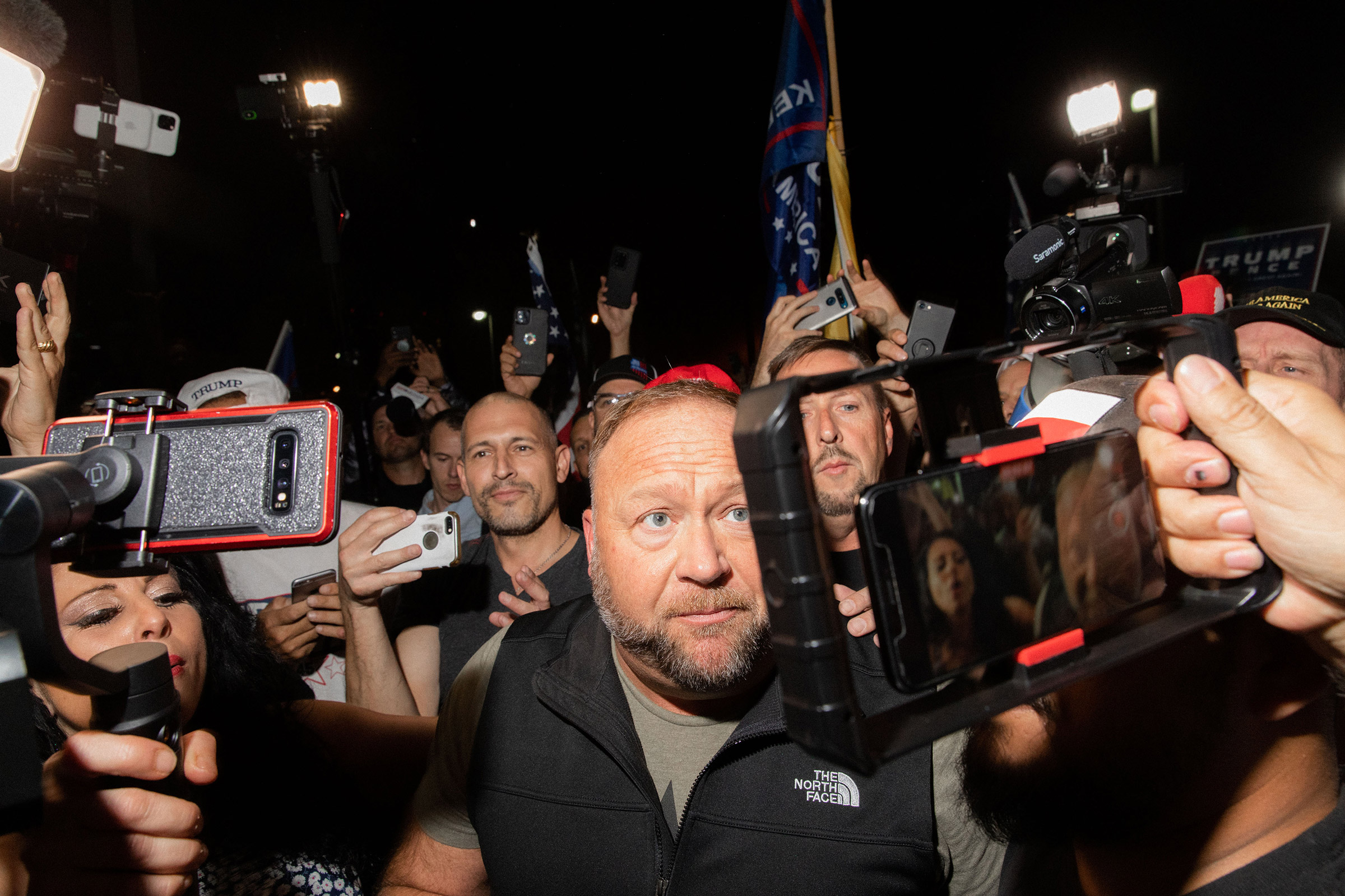 Alex Jones is mobbed at the Maricopa County Elections Office in Phoenix, AZ on November 5, 2020