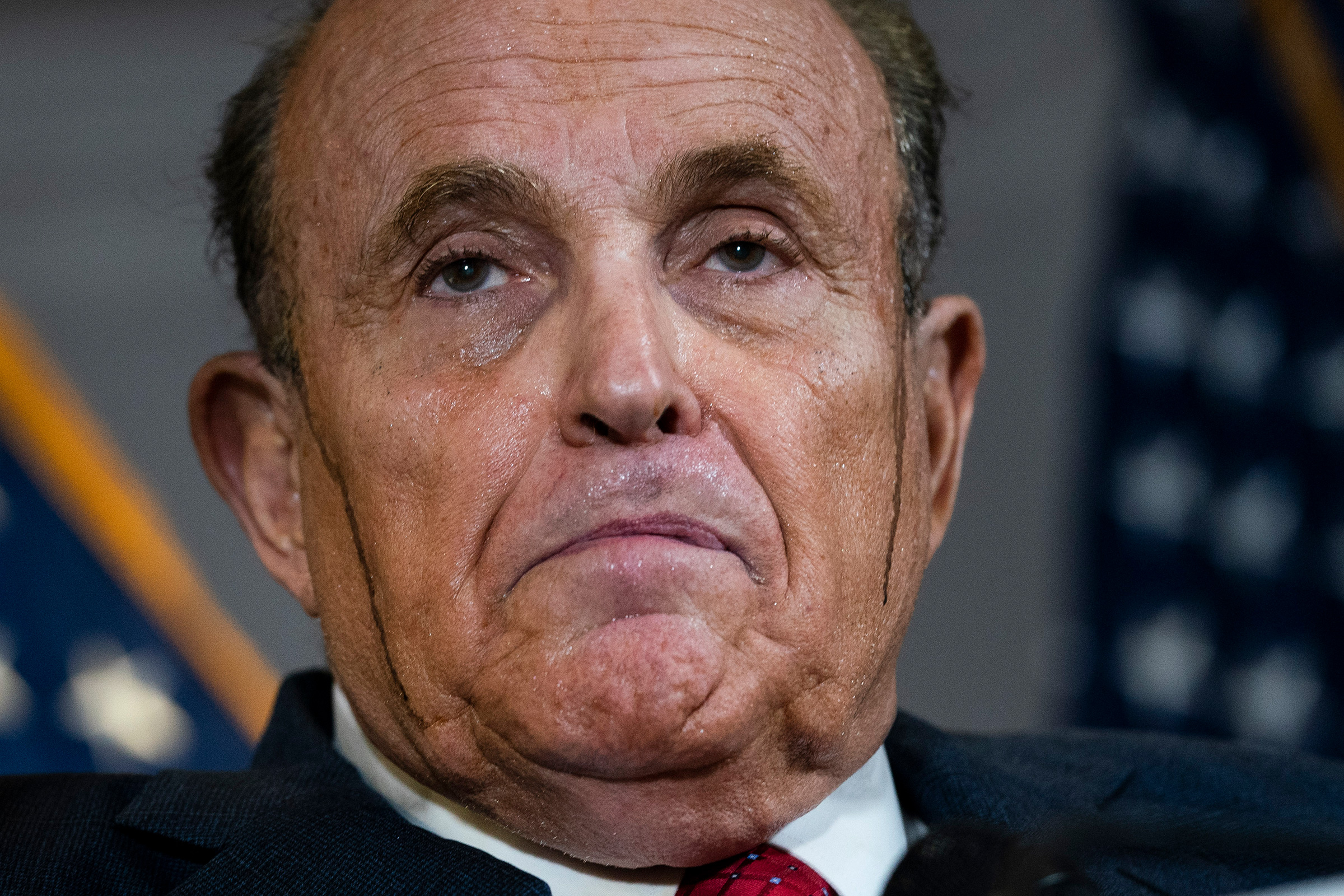 Rudy Giuliani speaks to the press about various lawsuits related to the 2020 election, inside the Republican National Committee headquarters in Washington, D.C., on Nov. 19, 2020. (Drew Angerer—Getty Images)