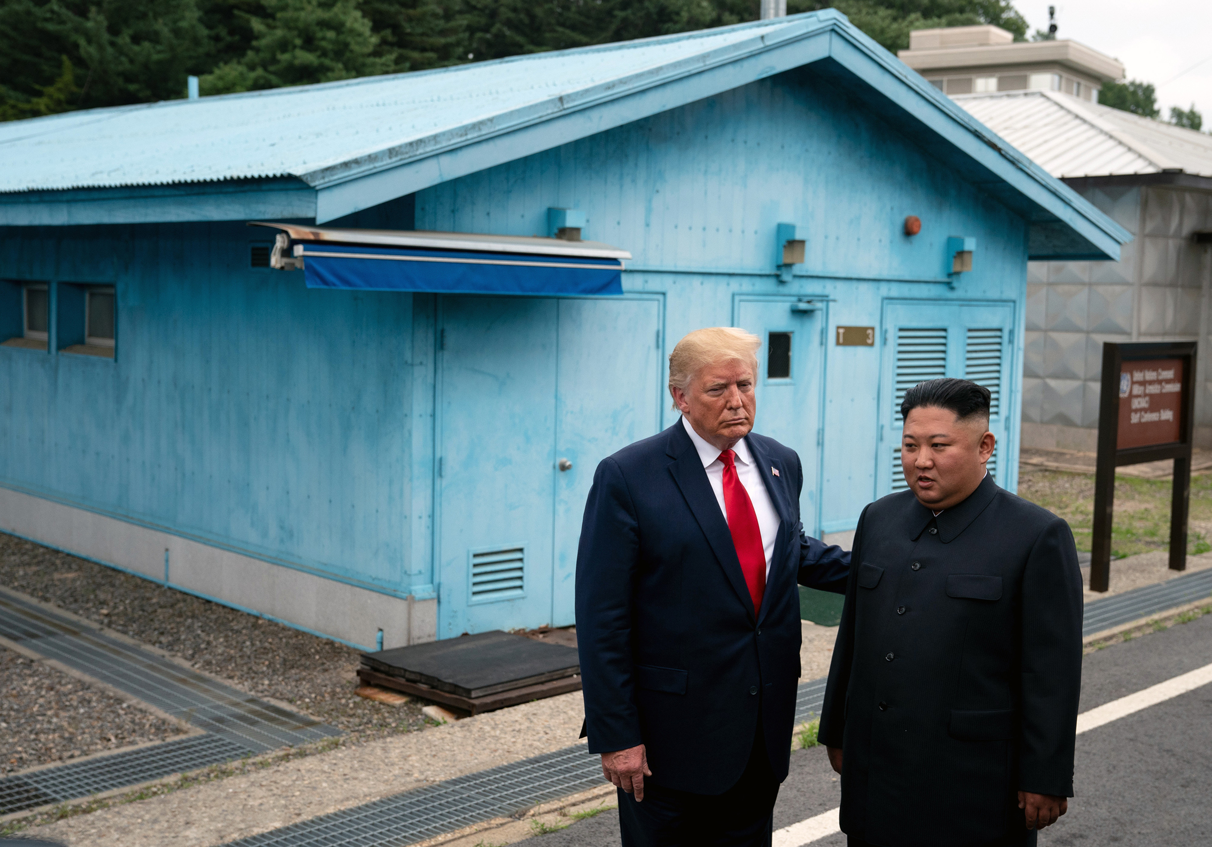 President Donald Trump and North Korean leader Kim Jong-un stand on the South Korean side of the Demilitarized Zone between on June 30, 2019
