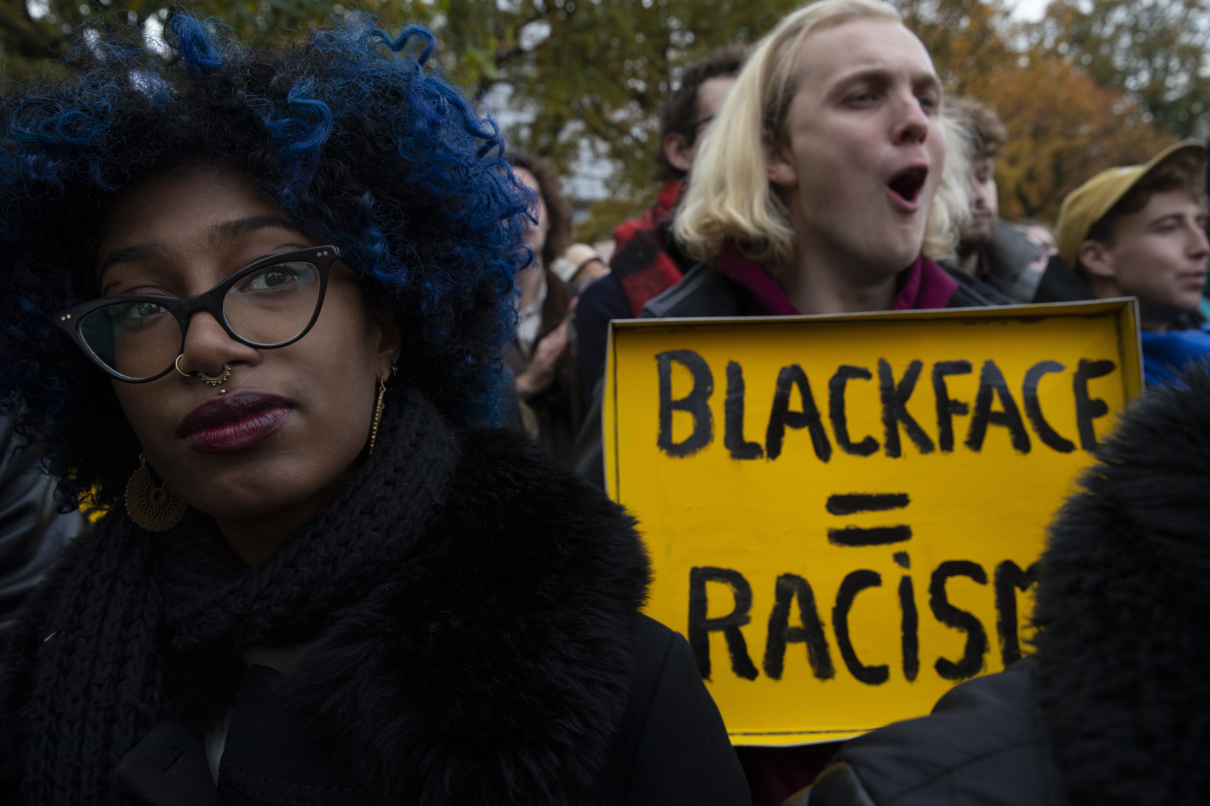 Kick Out Zwarte Piet, or Kick Out Black Pete demonstrators listen to speakers during a gathering in The Hague, Netherlands, on Nov. 16, 2019. (Peter Dejong—AP)
