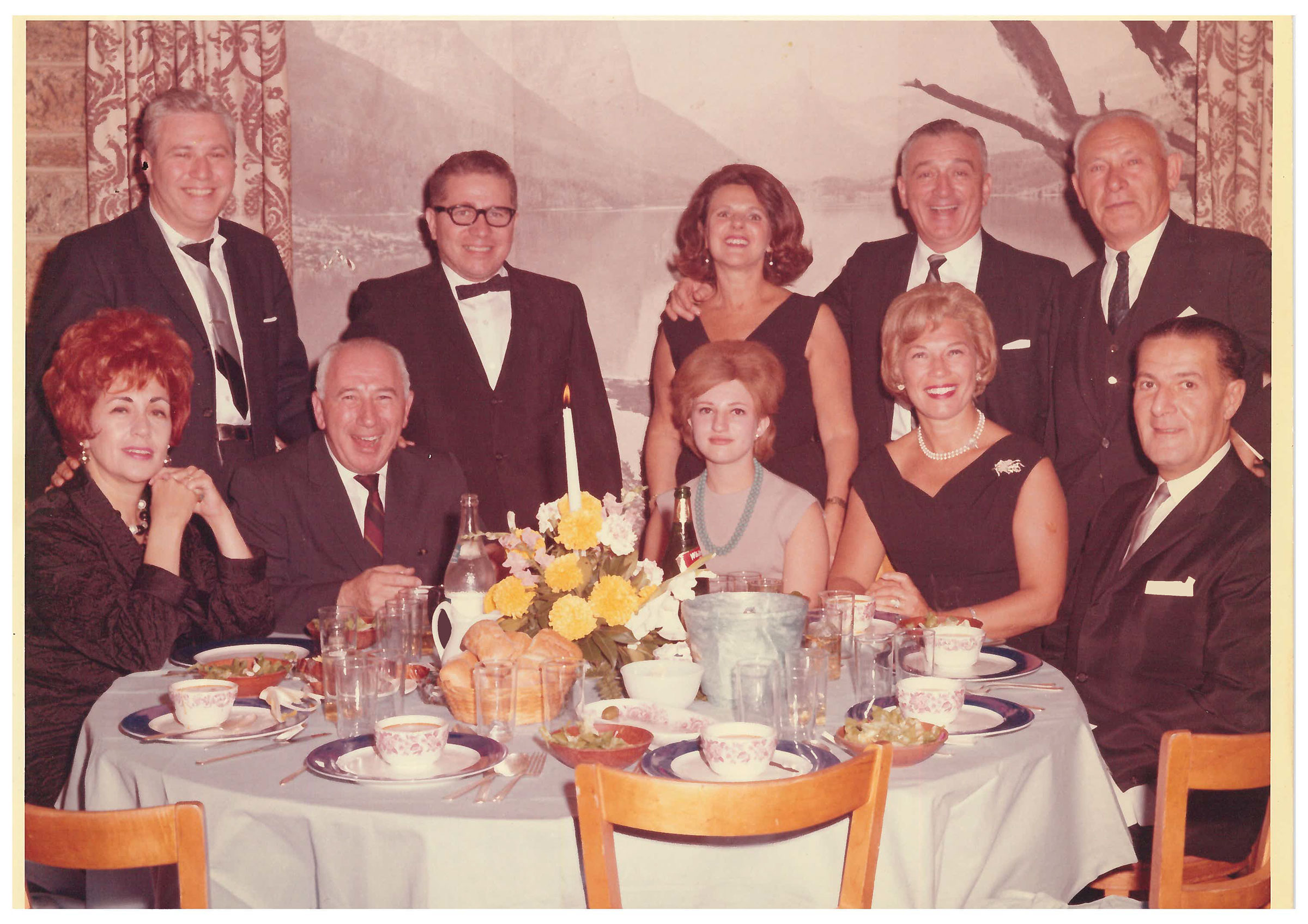 Torron, then 18 (bottom row center), seated next to her father Benjamin at a cousin's bar mitzvah in 1964; her family discovered the photo after being contacted by TIME. (Courtesy the Fine FamilyEllen)
