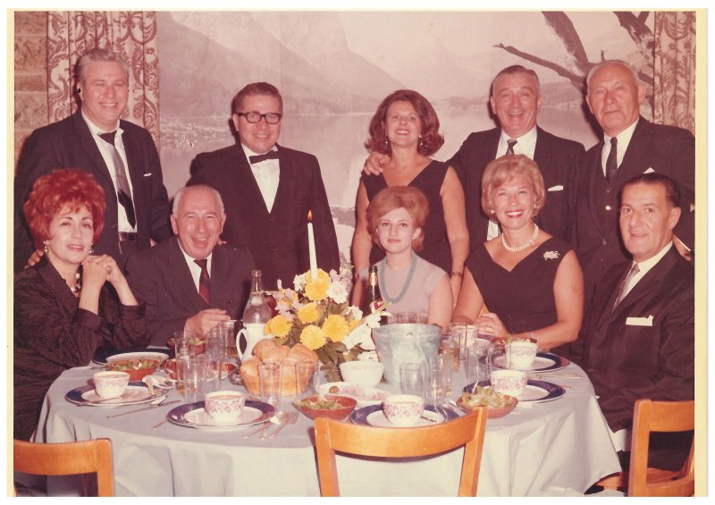 Torron, then 18 (bottom row center), seated next to her father Benjamin at a cousin's bar mitzvah in 1964; her family discovered the photo after being contacted by TIME.