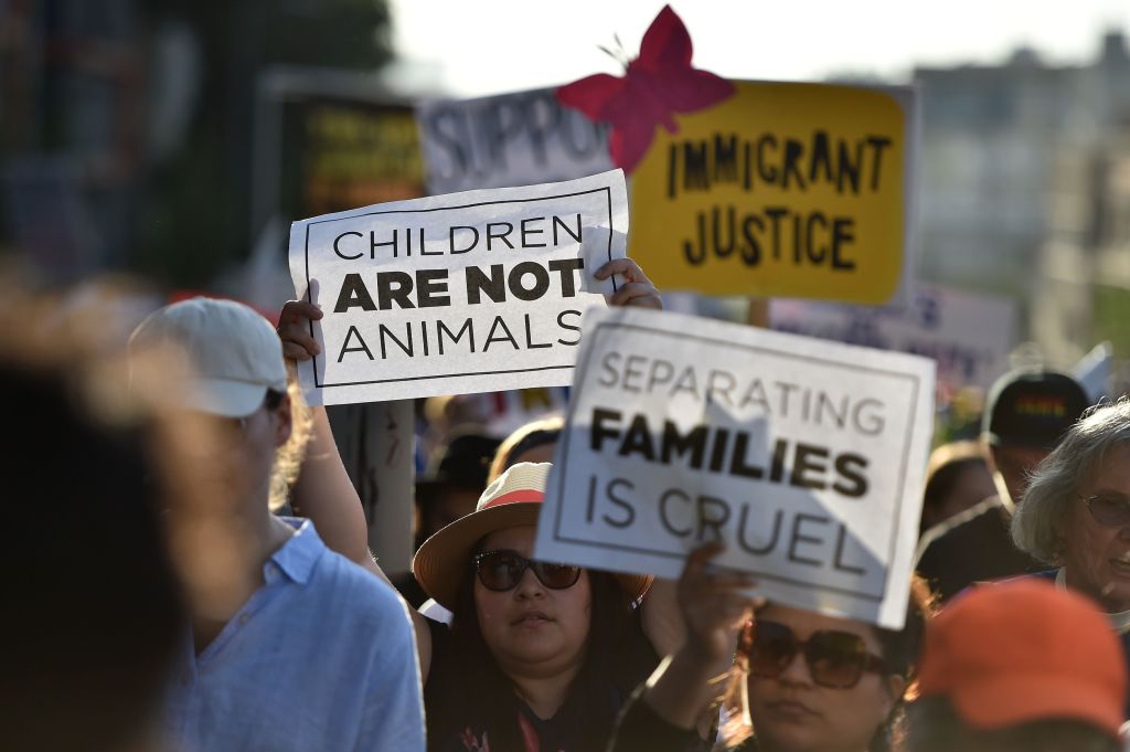Critics of U.S. government policy that separates children their parents when they cross the border illegally from Mexico protest during a 'Families Belong Together March', in downtown Los Angeles on June 14, 2018. (Robyn Beck—AFP via Getty Images)