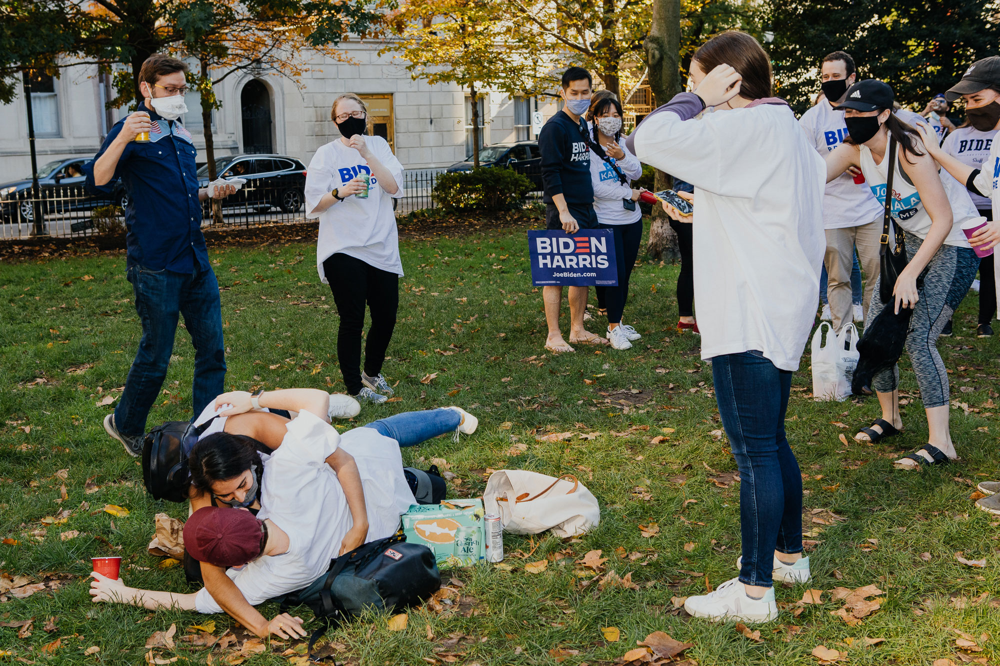Members of President-elect Joe Biden's staff celebrate his victory in Rittenhouse Square Park in Philadelphia on Nov. 7. (Michelle Gustafson for TIME)