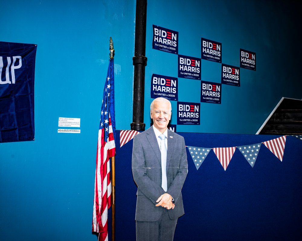 The different style of the campaignsâ€” and of their supportersâ€”was echoed in their Pennsylvania offices. Here, a cutout of Biden at the Erie County Democratic Party office.
