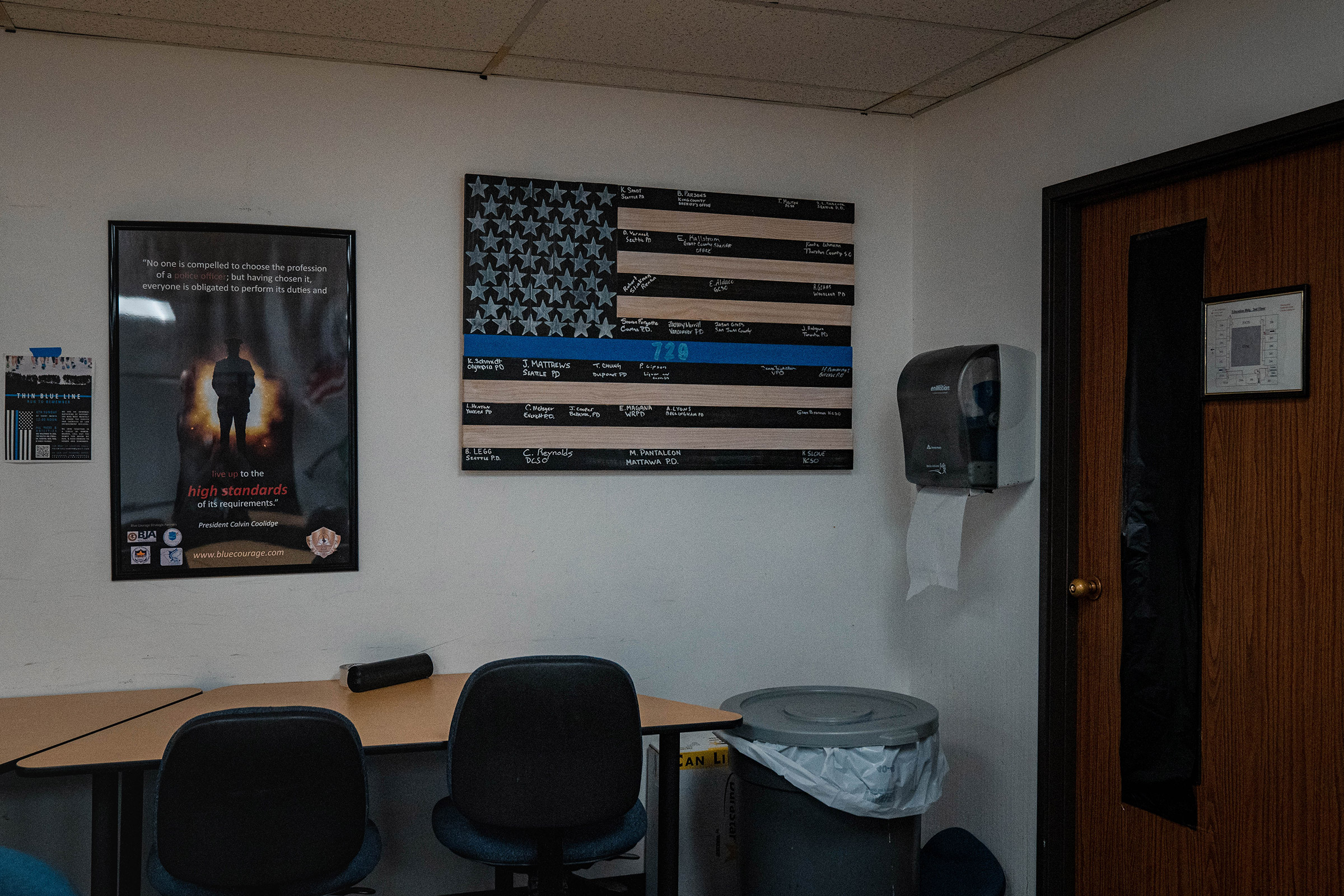 A flag on display in an out-of-use classroom.