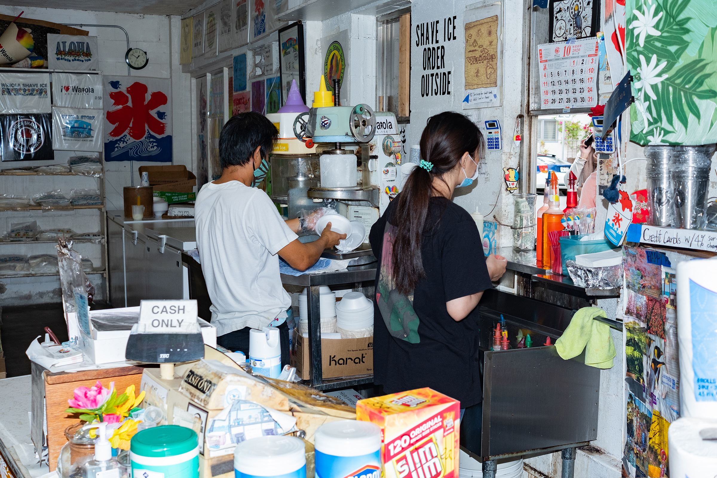 Inside Waiola Shave Ice, where employees receive orders though a window (Courtesy Bennet Tadashi Adamson)