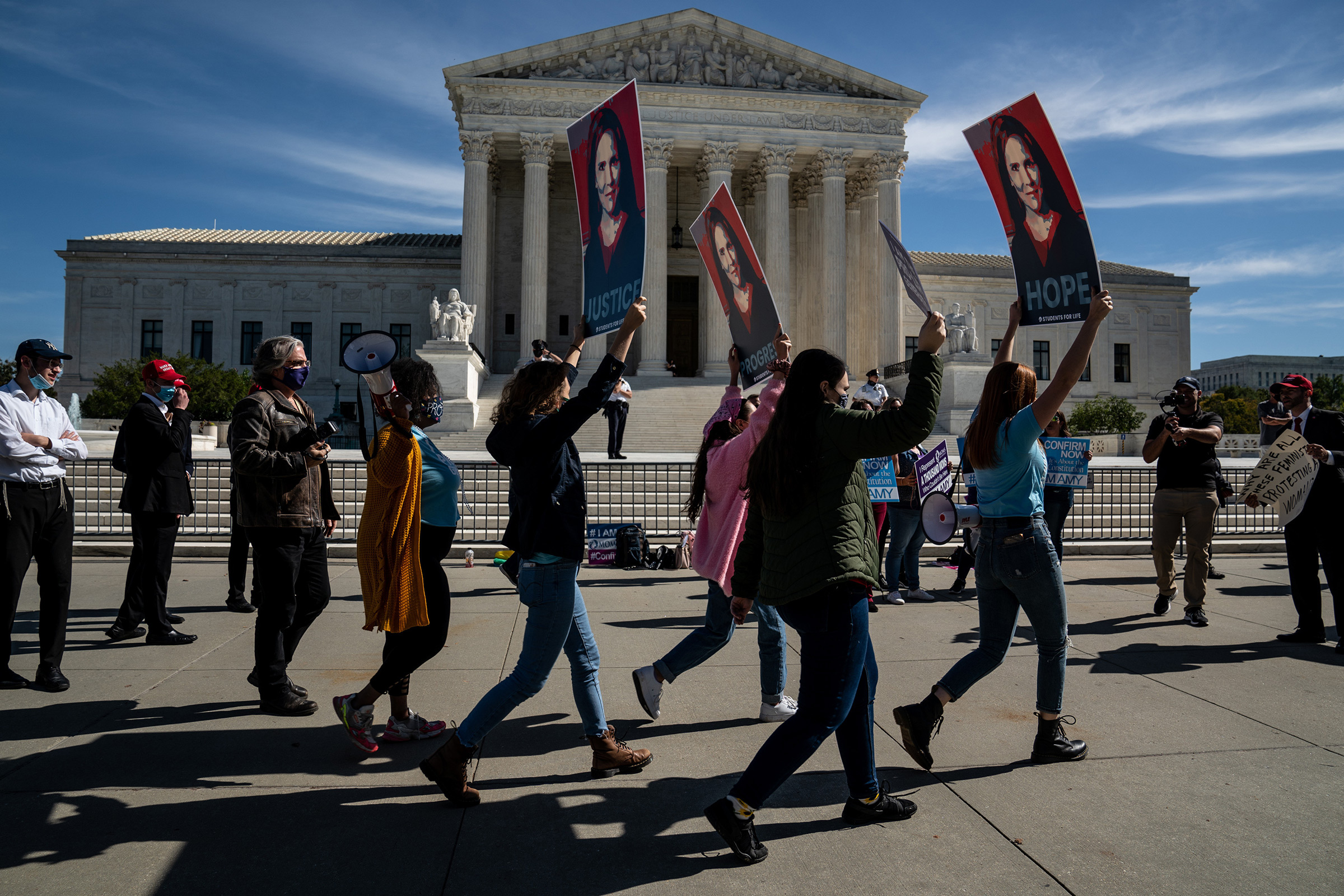 Supporters of Judge Amy Coney Barrett stand outside the Supreme Court in Washington, D.C., on Oct. 14. (Anna Moneymaker—The New York Times/Redux)