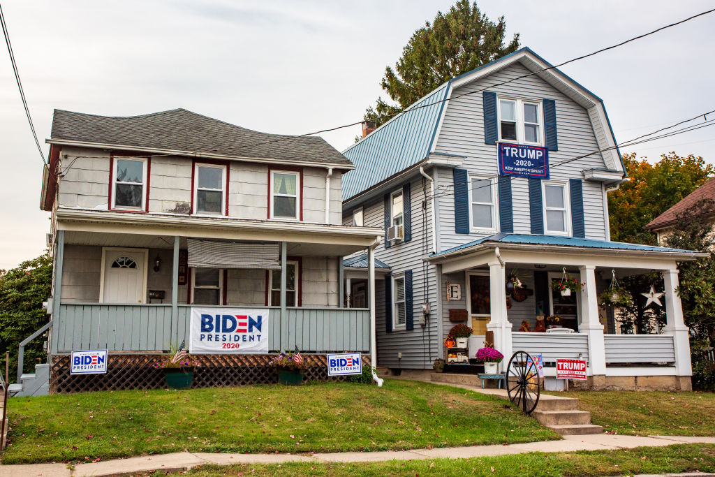 Neighboring houses display signs for opposing presidential candidates in Northumberland, Pa., a state being watched with great anticipation in the 2020 Election. (Paul Weaver/Pacific Press/LightRocket—Getty Images)