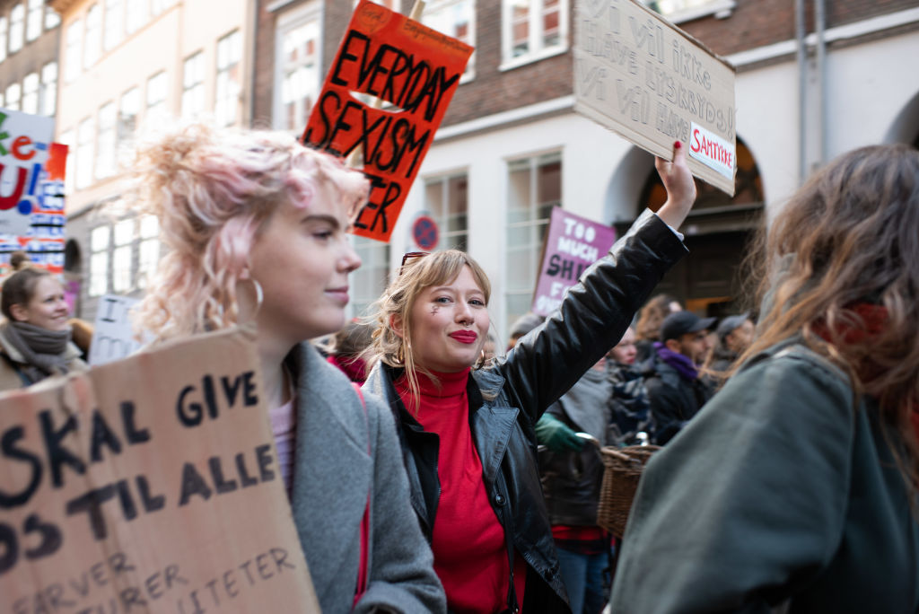 Demonstrators hold signs and march during a rally on International Women's Day from Frue Plads to Blagards Plads in the Norrebrogade neighborhood of Copenhagen, Denmark, on Friday, March 8, 2019. (Freya Ingrid Morales—Bloomberg/Getty Images)