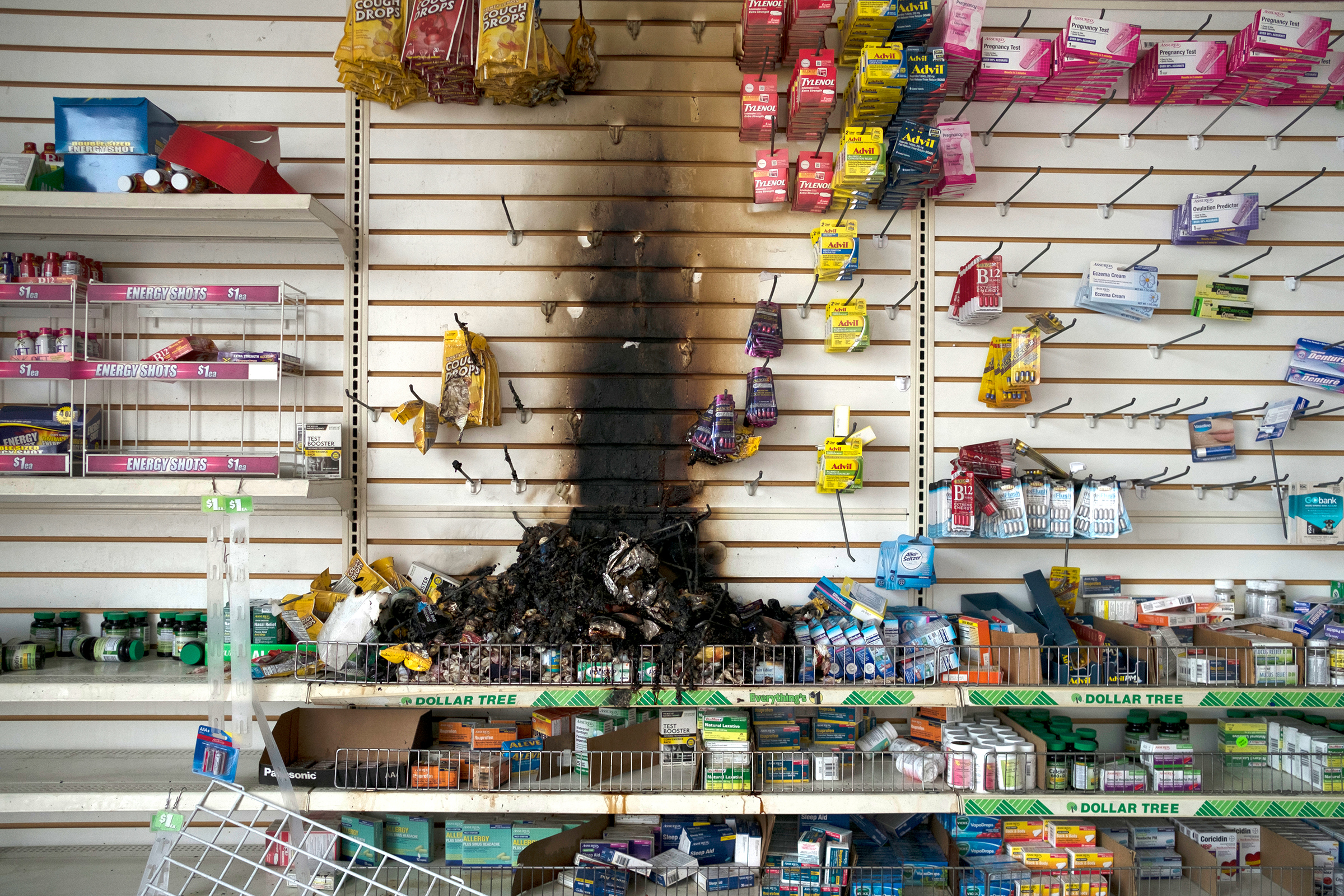 Fire damage is seen inside a Dollar Tree in Minneapolis on May 28, following nights of protests and vandalism in response to the police killing of George Floyd three days earlier. (Brooklynn Kascel—Polaris)