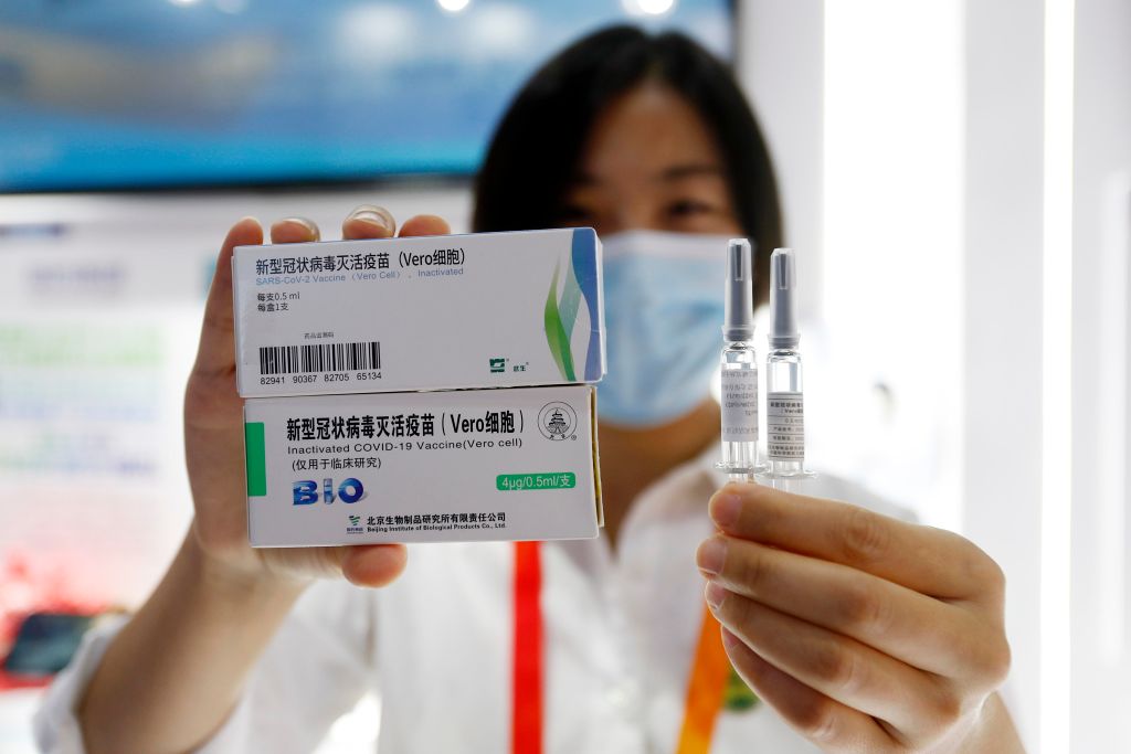 An exhibitor shows inactivated COVID-19 vaccine candidate from China National Biotec Group (CNBG) of Sinopharm Group during the 2020 China International Fair for Trade in Services at the Beijing Olympic Park on Sept. 5, 2020 in Beijing, China. (Han Haidan–China News Service/Getty Images)