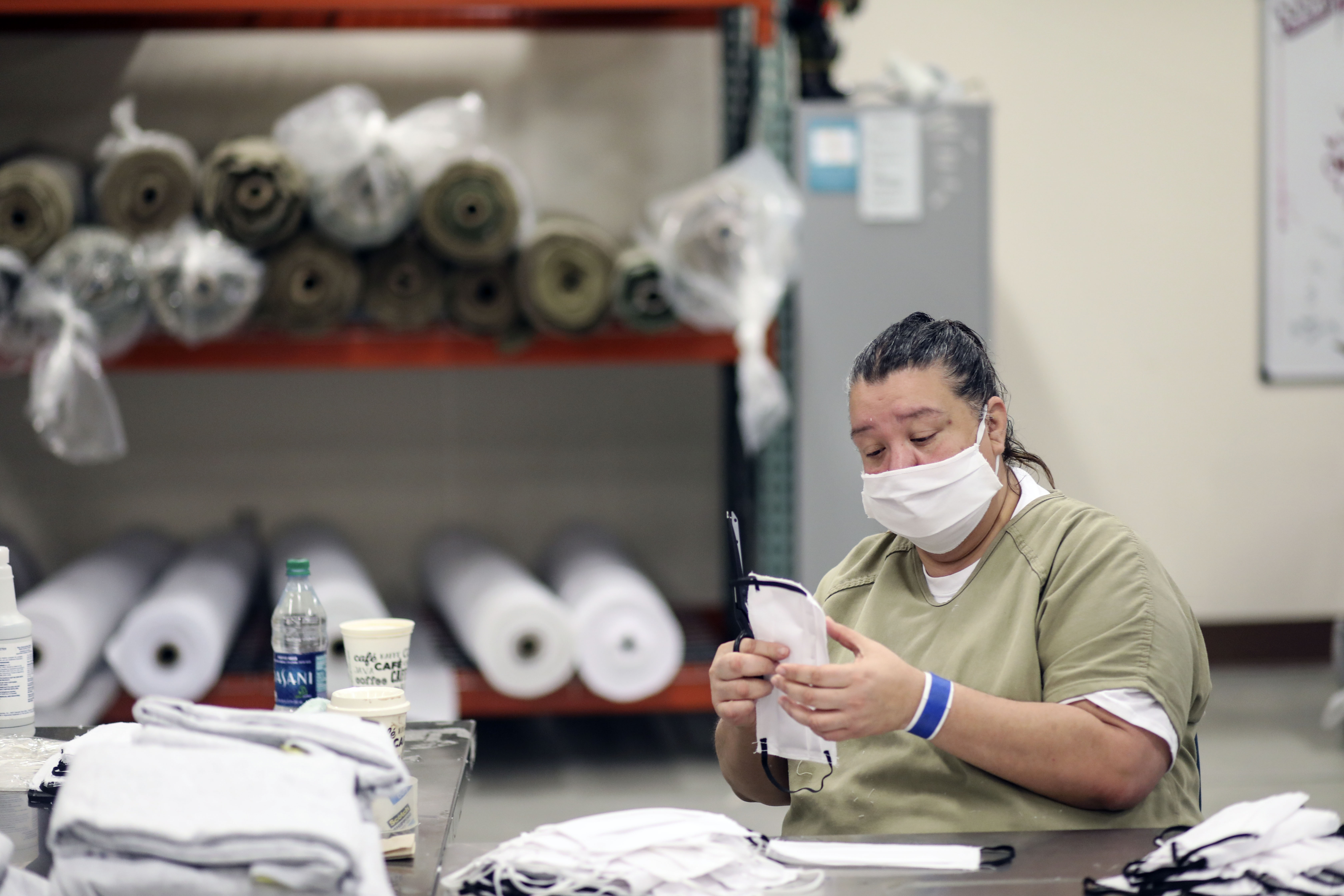 An inmate sews protective masks at Las Colinas Women's Detention Facility in Santee, California, on April 22, 2020.