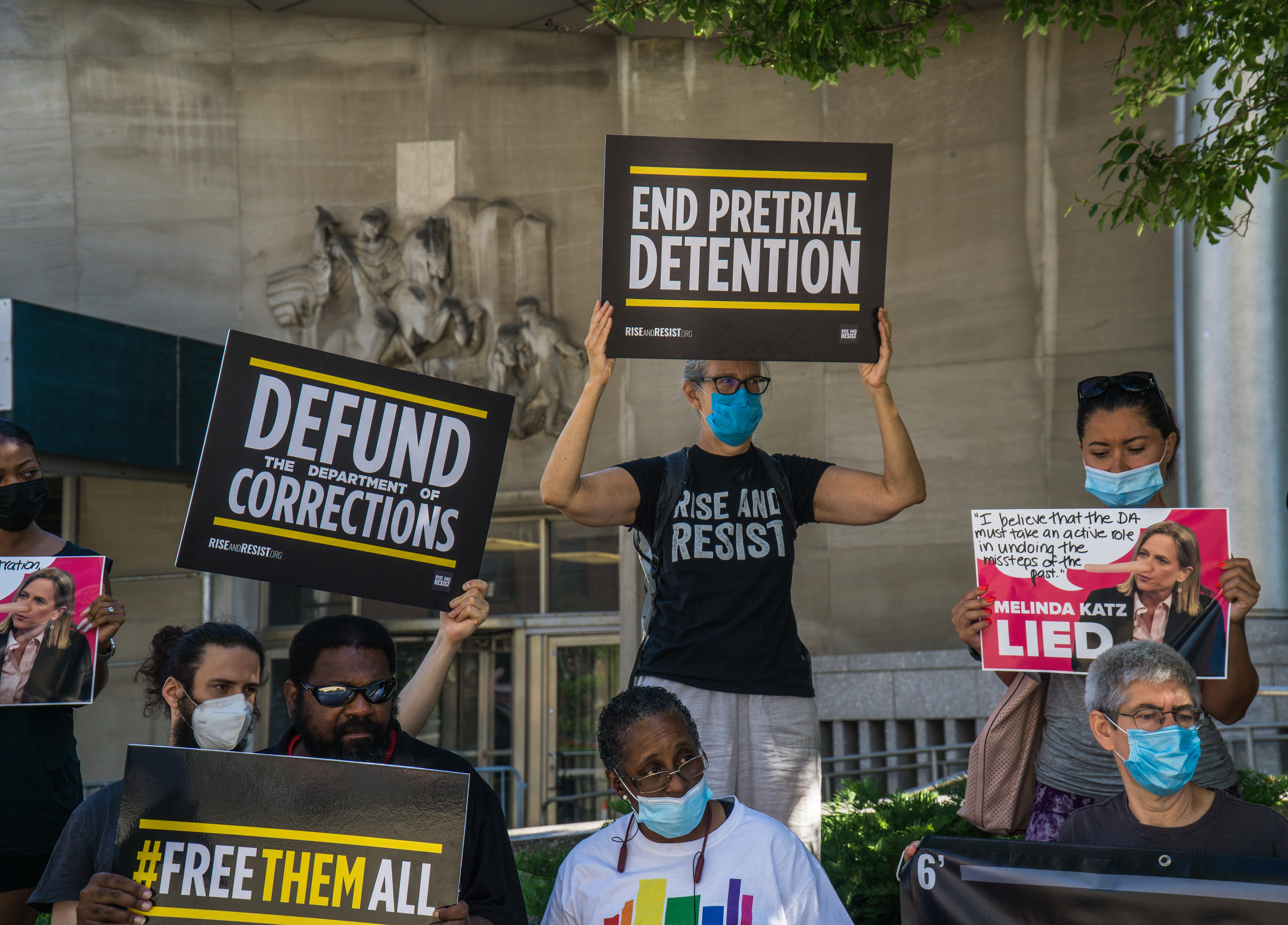 New York City residents and community groups protest and demand that Queens District Attorney Melinda Katz takes immediate action to stop the spread of COVID-19 in the borough's jails.