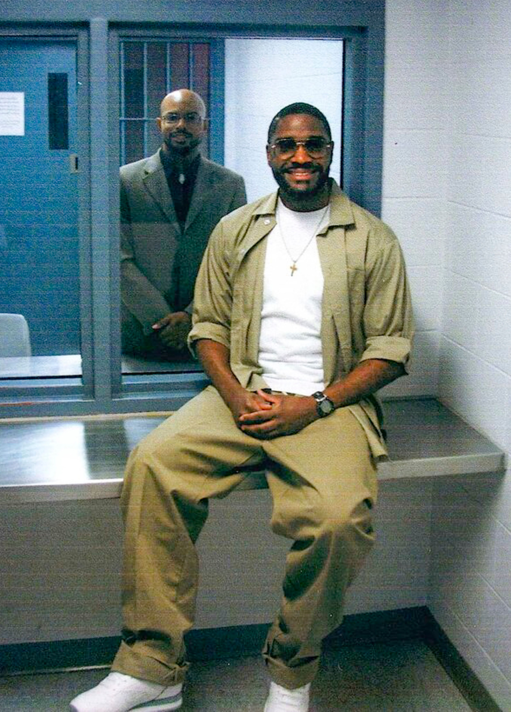 Federal inmate Brandon Bernard, right, with Pastor Aaron Chancy, left, as Bernard as he waited his scheduled execution in Terre Haute, Ind. Bernard was executed on Dec. 10. (EPA/Shutterstock)