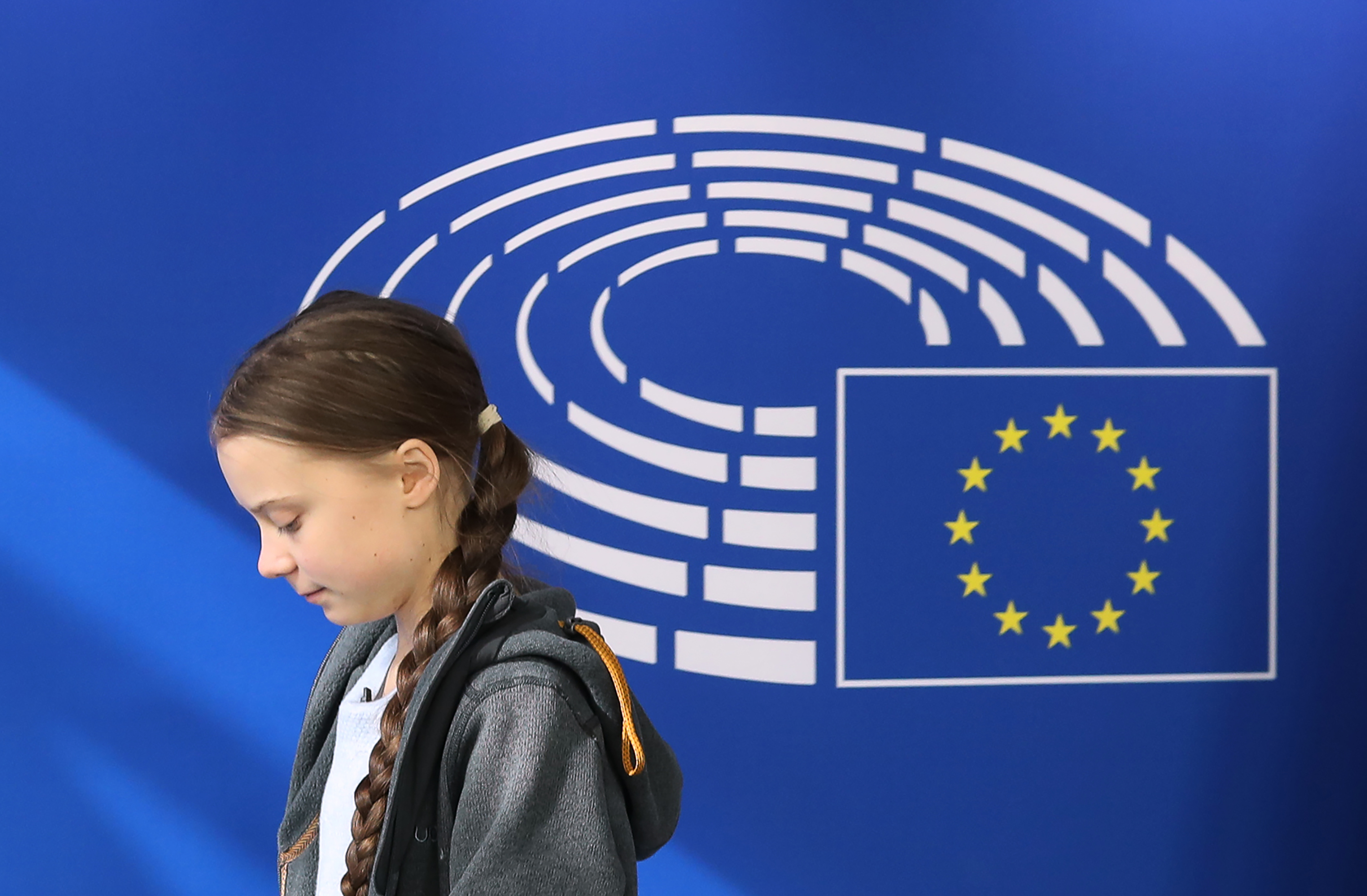 Greta Thunberg arrives at the European Parliament in Brussels on March 4, 2020, on the day the European Union unveiled a landmark law to achieve "climate neutrality" by 2050. (Kenzo Tribouillard—AFP/Getty Images)