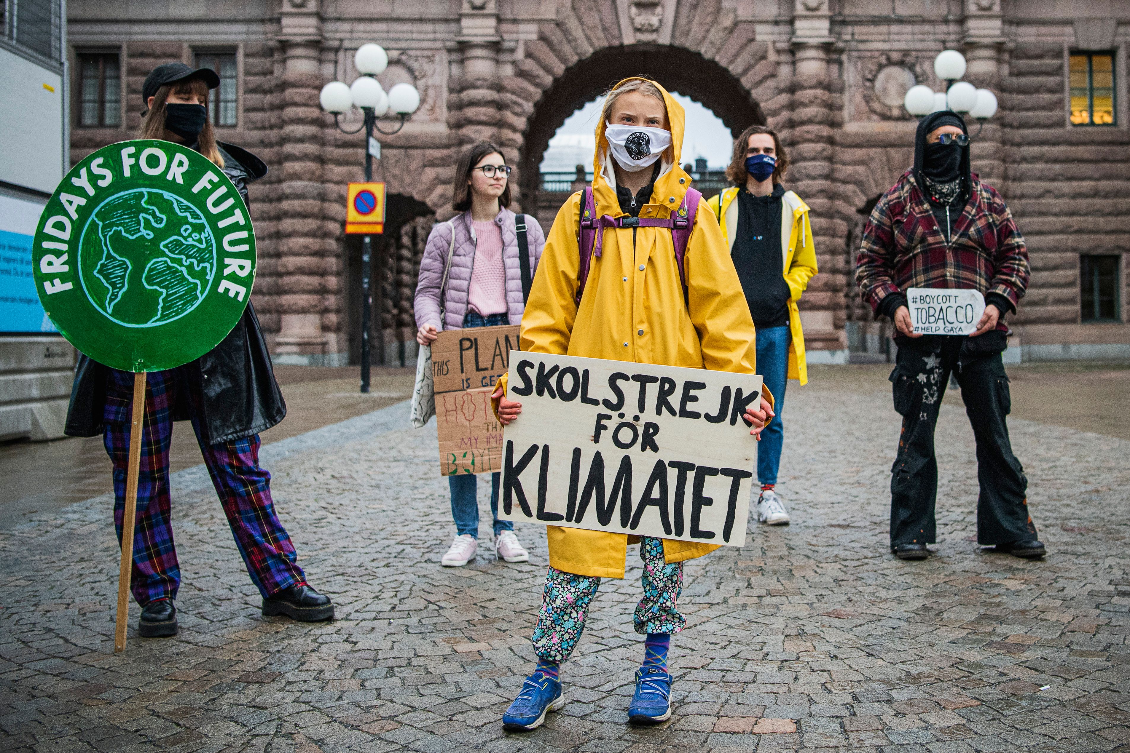 Swedish climate activist Greta Thunberg joins a a "Fridays for Future" protest in front of the Swedish Parliament in Stockholm on Oct. 9, 2020. (Jonathan Nackstrand—AFP/Getty Images)