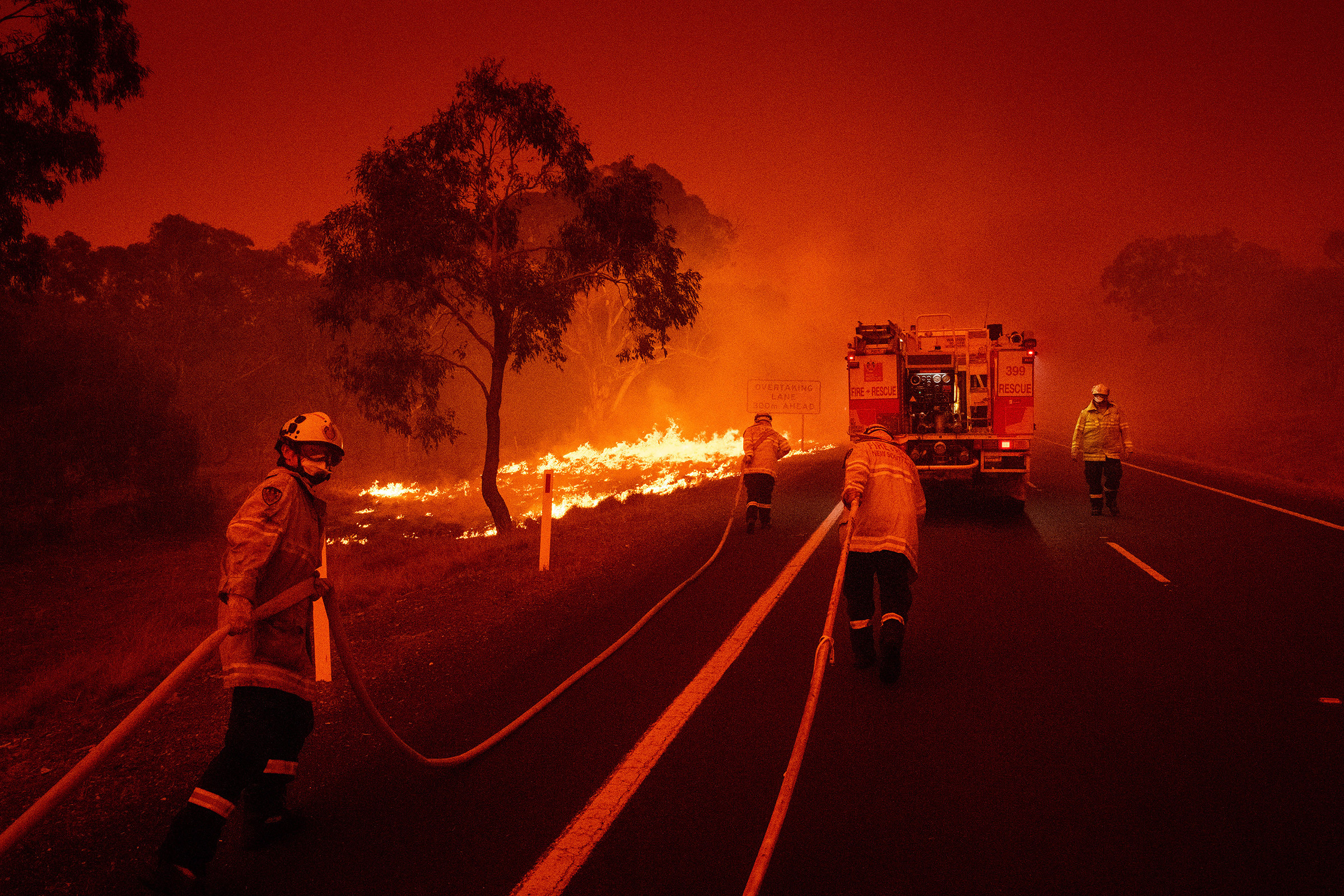 Firefighters on the outskirts of Bredbo, New South Wales, Australia, on Feb. 1 (Matthew Abbott—The New York Times/Redux)