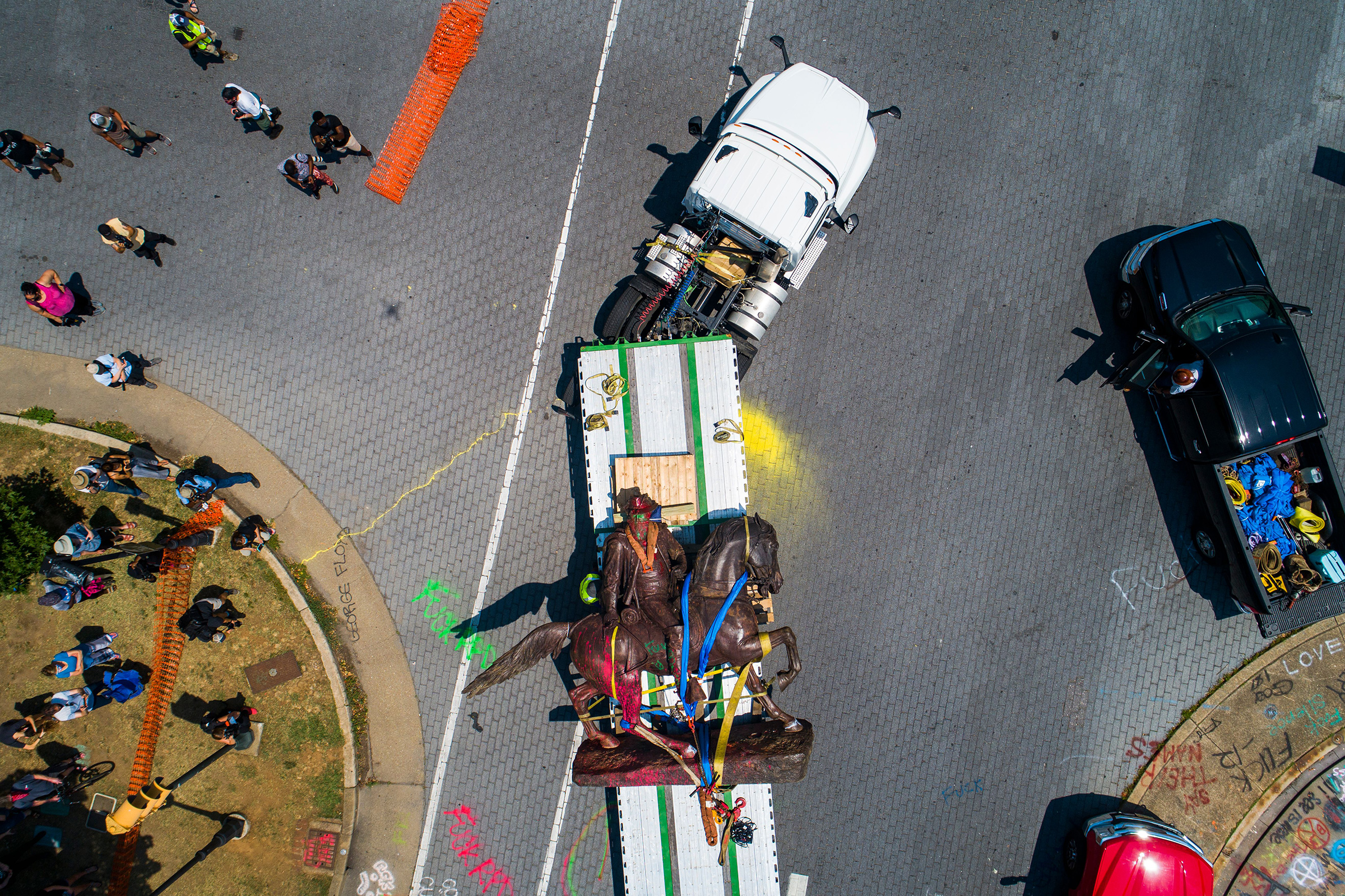 An aerial view from a drone shows workers removing a statue of Confederate General J.E.B. Stuart from Monument Avenue in Richmond, Va., on July 7. (Jim Lo Scalzo—EPA-EFE/Shutterstock)