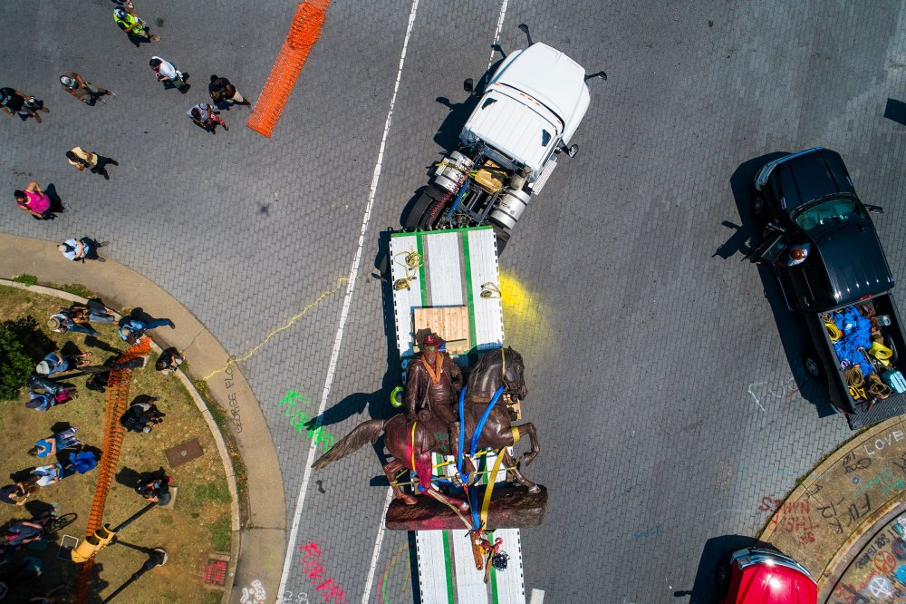 An aerial view from a drone shows workers removing a statue of Confederate General J.E.B. Stuart from Monument Avenue in Richmond, Va., on July 7.