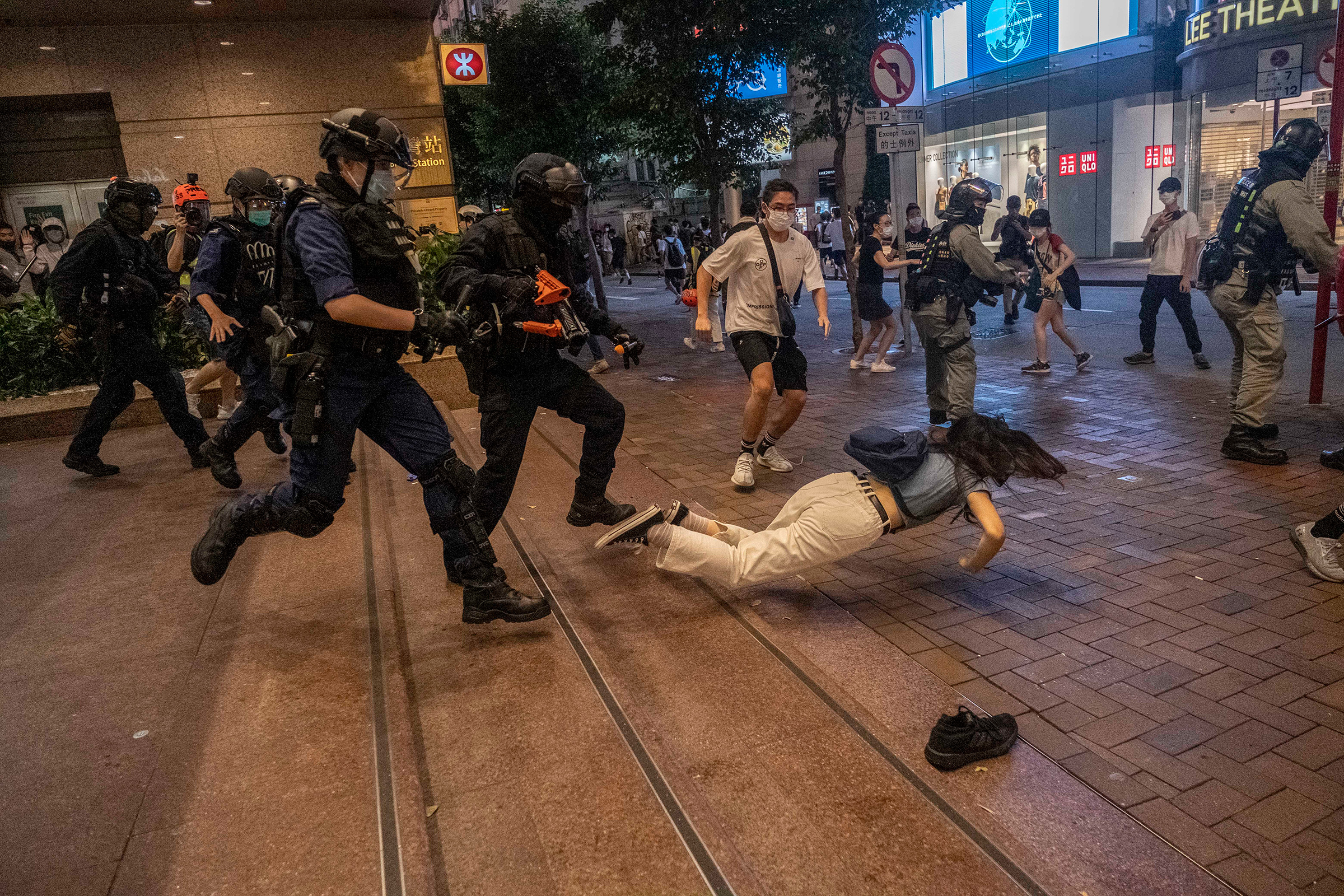 Police clash with protesters in Hong Kong on July 1, 2020, one day after a new national security law went into effect. The city immediately felt the chilling effect of Beijing's offensive to quash dissent in the semiautonomous territory.