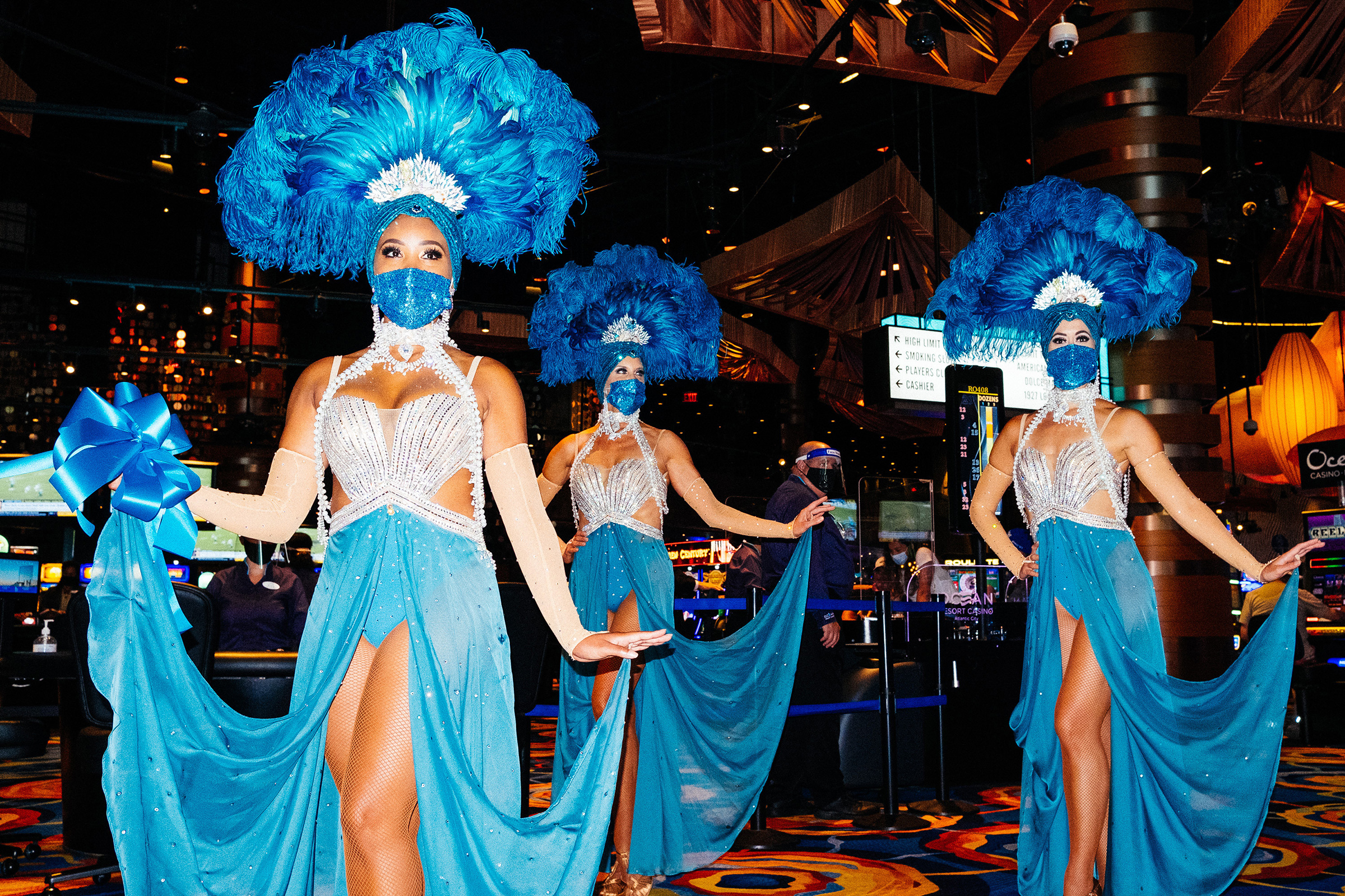 Showgirls wearing protective masks are seen inside Atlantic City's Ocean Casino Resort on July 2, 2020.
