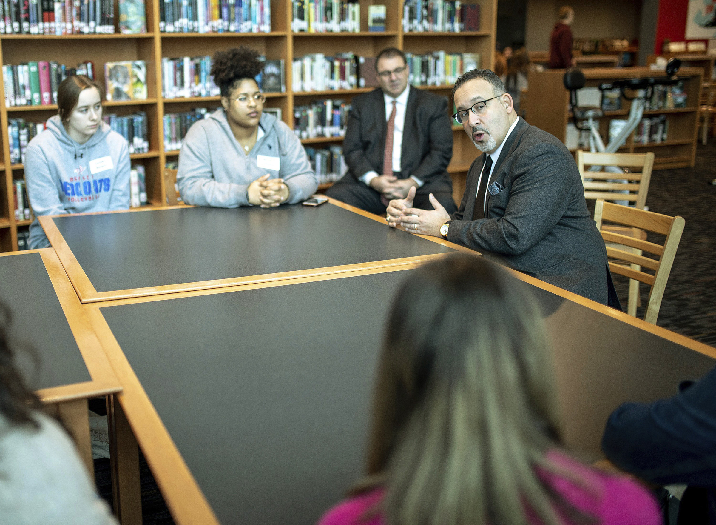 Connecticut Commissioner of Education Miguel Cardona speaks with Berlin High School students while on a tour of the school on Jan. 28, 2020. (Devin Leith-Yessian—Berlin Citizen/Record-Journal/AP)