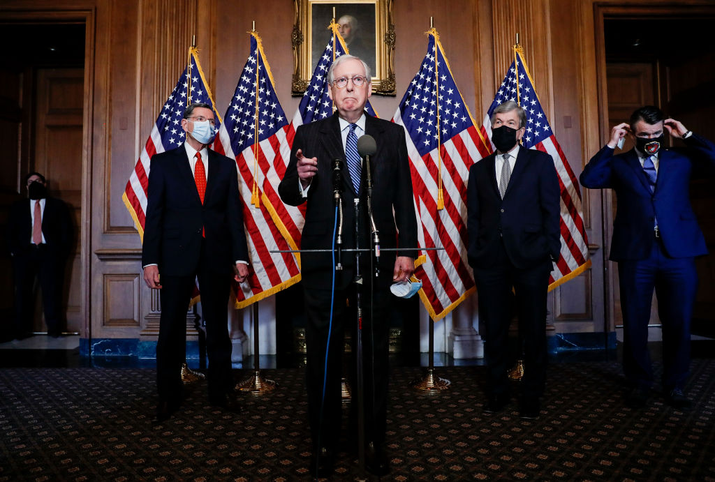 U.S. Senate Majority Leader Mitch McConnell (R-KY) takes questions as he speaks during a news conference with other Senate Republicans at the U.S. Capitol on December 15, 2020, in Washington, D.C.