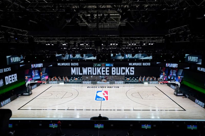 The court and benches are empty after the scheduled start of game five between the Milwaukee Bucks and the Orlando Magic in the first round of the 2020 NBA Playoffs at AdventHealth Arena at ESPN Wide World Of Sports Complex on August 26, 2020 in Lake Buena Vista, Florida.