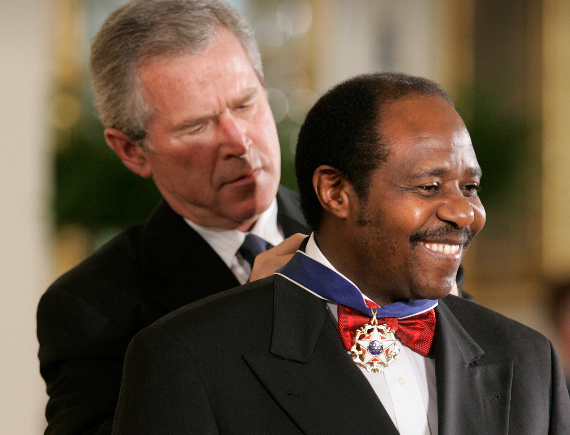 President Bush awards Paul Rusesabagina the Presidential Medal of Freedom Award in Washington, D.C., on Nov. 9, 2005.