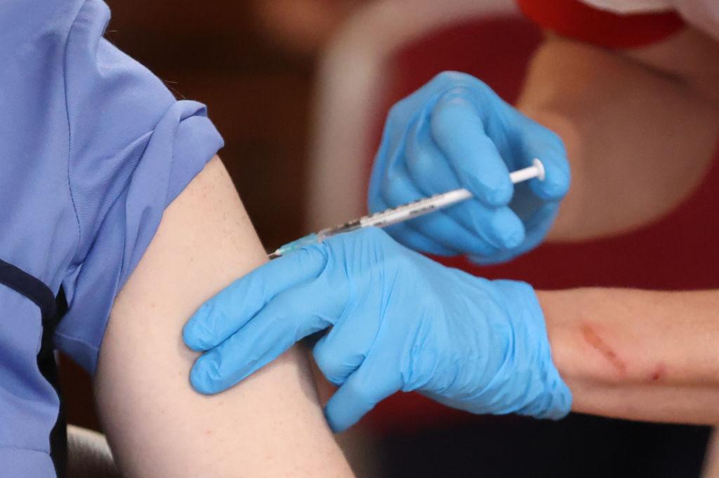 Care home staff receive the Pfizer/BioNtech COVID-19 vaccine at Bradley Manor residential care home in Belfast. (Liam McBurney—PA Image/Getty Images)