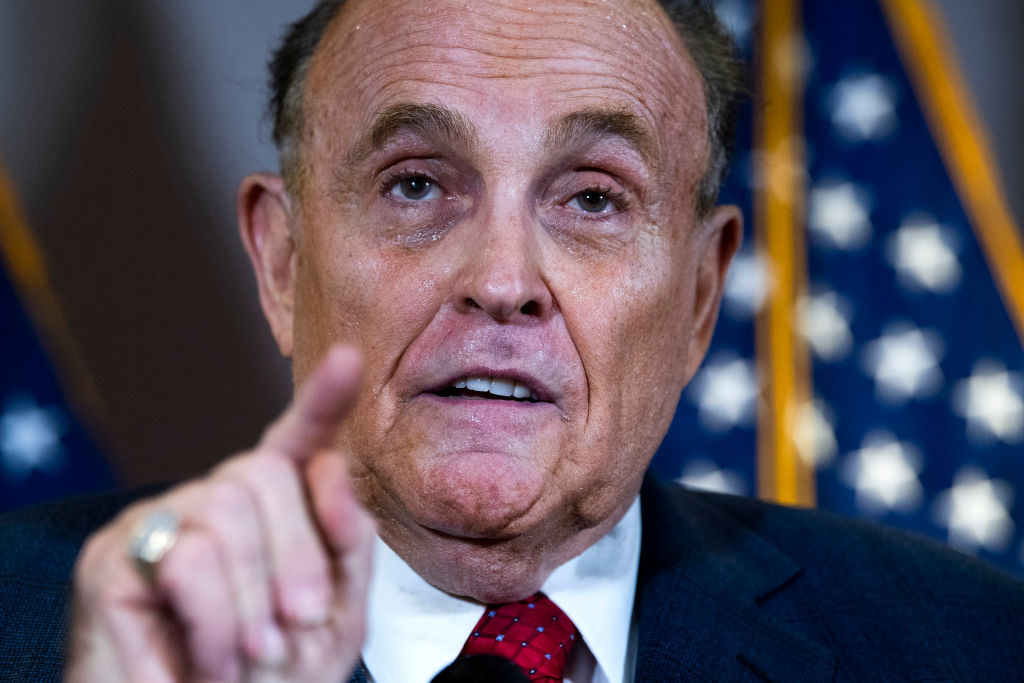 Rudolph Giuliani, attorney for President Donald Trump, conducts a news conference at the Republican National Committee on lawsuits regarding the outcome of the 2020 presidential election on Thursday, Nov. 19, 2020. (Tom Williams–CQ-Roll Call/Getty Images)