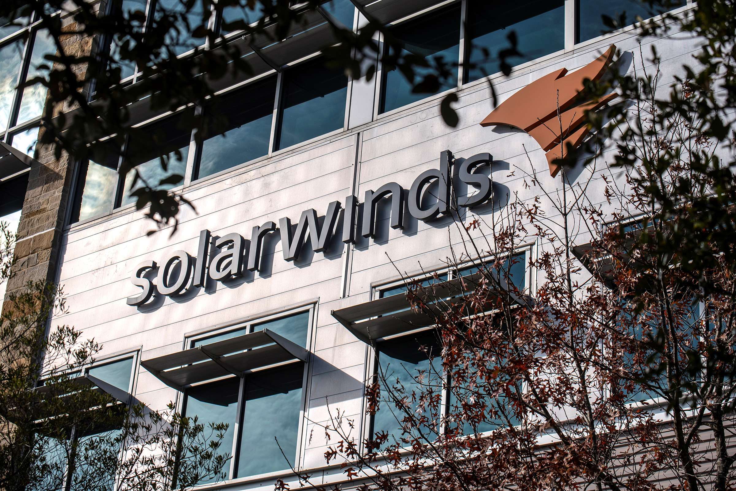 The SolarWinds logo is seen outside its headquarters in Austin, Texas, on Dec. 18