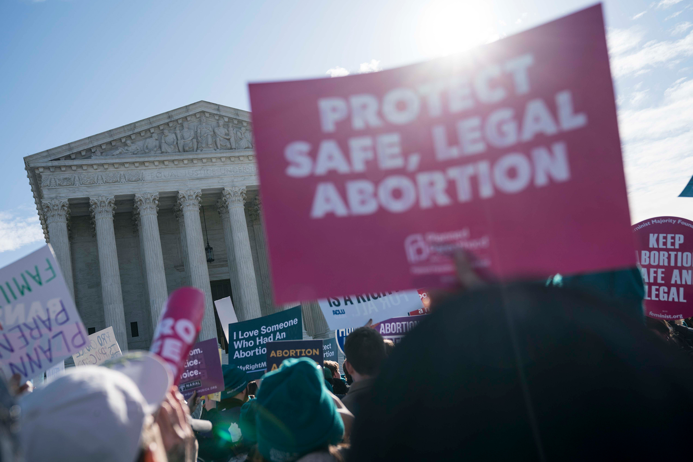 People participate in an abortion rights rally outside of the Supreme Court on March 4 (Sarah Silbiger—Getty Images)