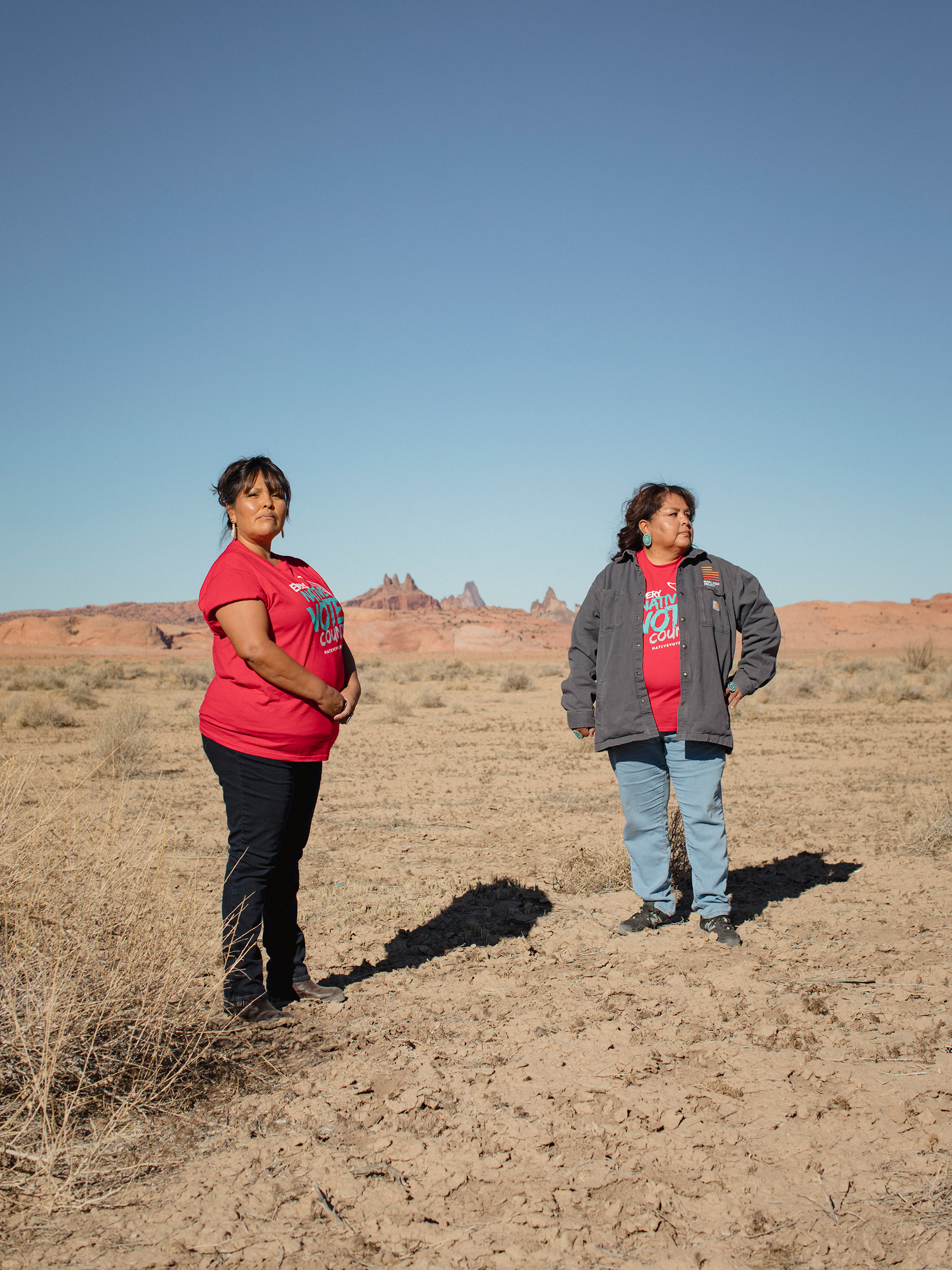 (L-R) Tara Benally and Dalene Redhorse pose for a portrait in front of Church Rock in Navajo County, Arizona on December 4, 2020. CREDIT: Adria Malcolm for TIME Magazine (Adria Malcolm for TIME Magazine—Adria Malcolm)