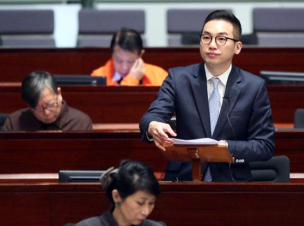 Former pro-democracy lawmaker Alvin Yeung Ngok-Kiu, pictured in March 2016 in the Hong Kong Legislative Council, was among dozens arrested Jan. 6, 2021 in a massive sweep of pro-democracy activists and politicians accused of violating the city's national security law. (K. Y. Cheng–South China Morning Post/Getty Images)