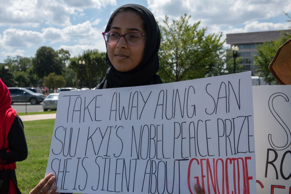 People hold banners as they stage a demonstration near the U.S. Capitol building on August 25, 2018, in Washington, United States, to protest against massacres carried out by the Myanmar military against Rohingya (Yasin Ozturk/Anadolu Agency/Getty Images)