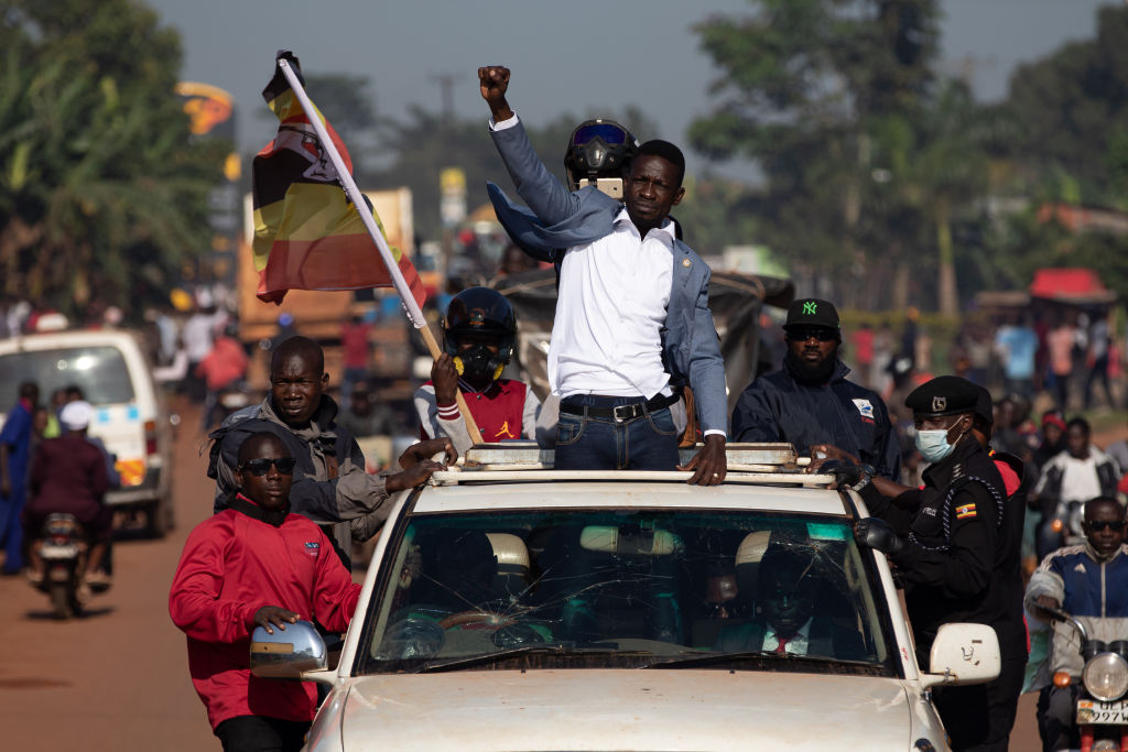 Bobi Wine parades through crowds of people in Kayunga District on Dec. 01, 2020 in Jinja, Uganda (Getty Images)