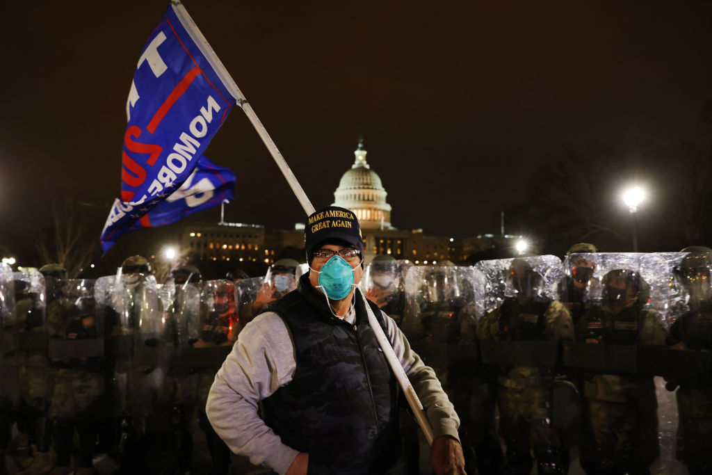Members of the National Guard and the Washington D.C. police keep a small group of demonstrators away from the U.S. Capitol on January 06, 2021 in Washington, DC. (Spencer Platt/Getty Images)