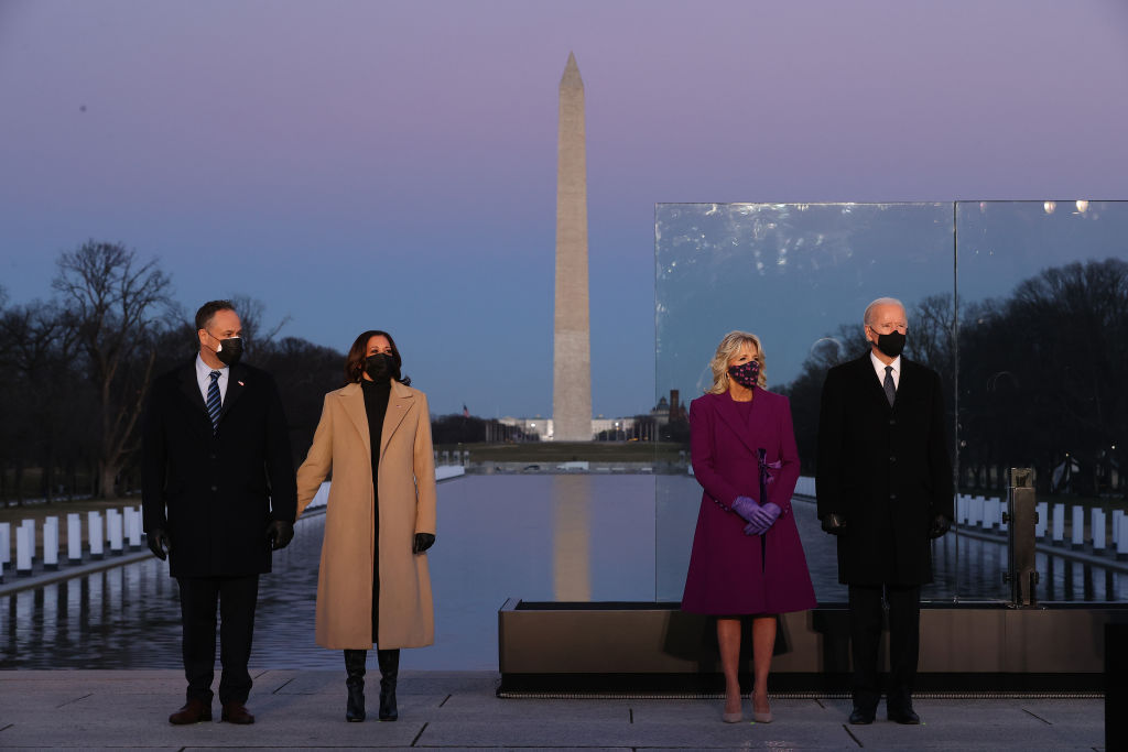 Douglas Emhoff, Kamala Harris, Jill Biden and Joe Biden attended a memorial service to honor the nearly 400,000 American victims of the coronavirus pandemic at the Lincoln Memorial Reflecting Pool on Jan. 19, 2021 in Washington, D.C. (Getty Images—2021 Getty Images)