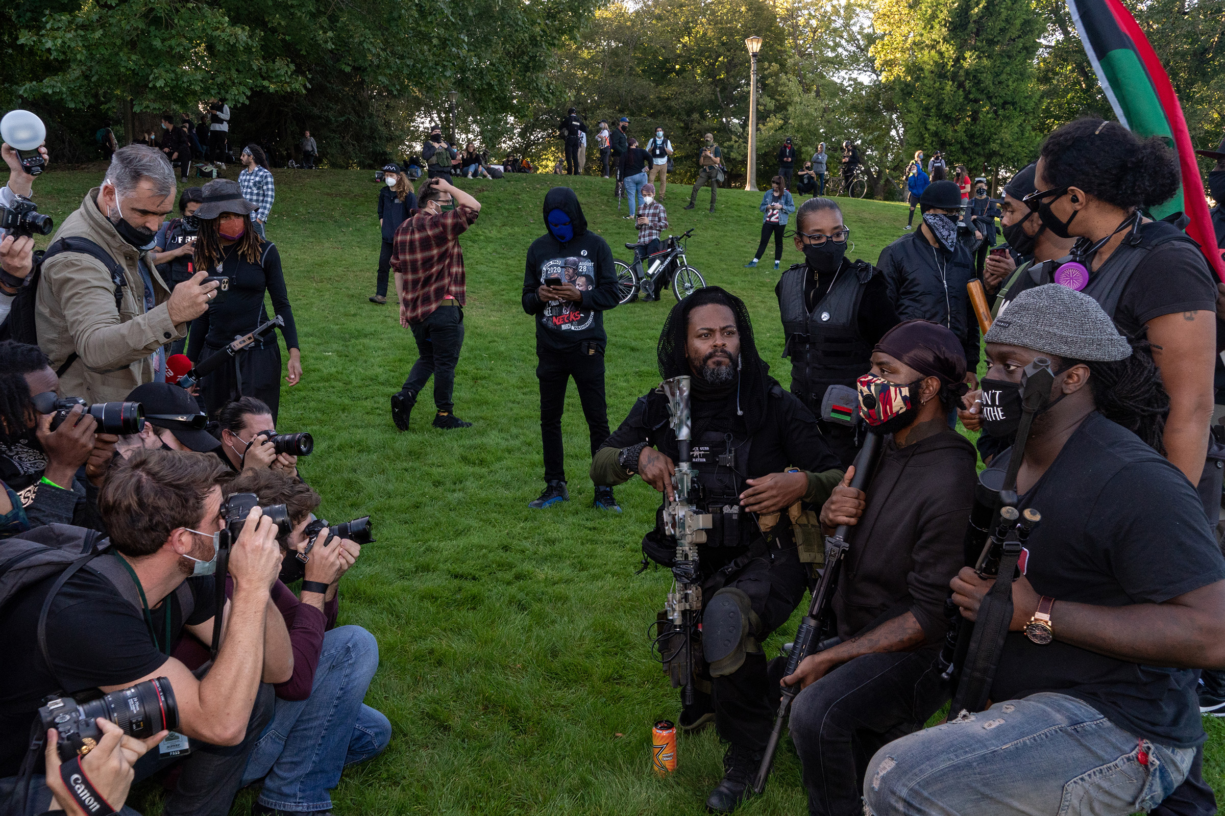 <strong>Portland, Ore., Sept. 26, 2020.</strong> "Militia members pose for the media at a Black Lives Matter protest. On the same day, in a nearby park, a Black Lives Matter rally dissolved into infighting. The situation was deescalated by this Black militia, which posed for photos." (Peter van Agtmael—Magnum Photos for TIME)