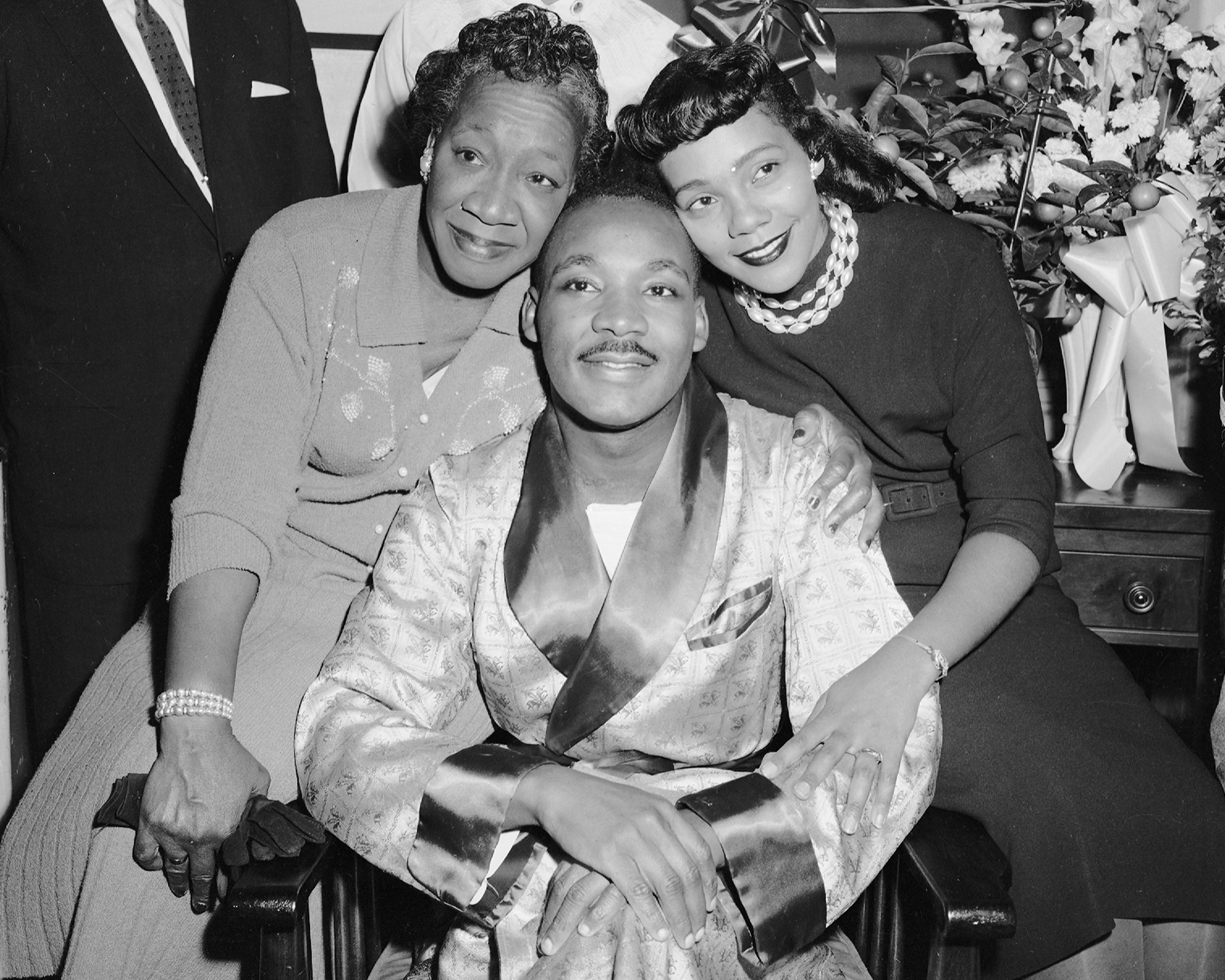 Dr. Martin Luther King with his mother Alberta and his wife, Coretta, smiling and cheerful during a press conference at Harlem Hospital, N.Y., in 1958. (Al Pucci—NY Daily News Archive/Getty Images)